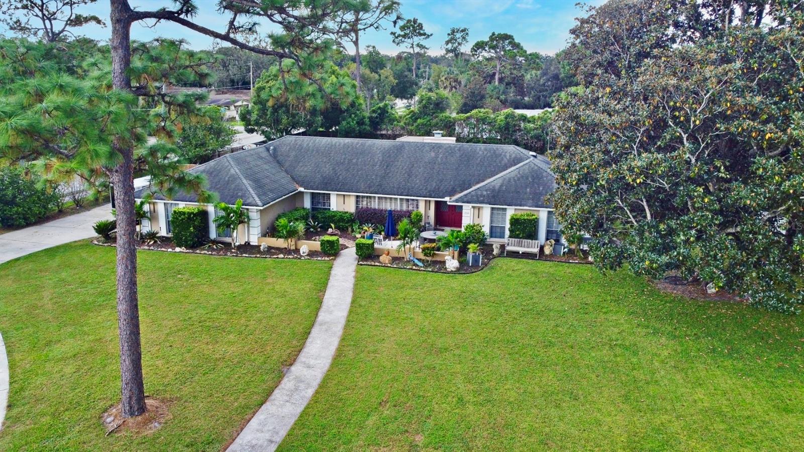 Your Dream Home Awaits! Discover the perfect combination of space, comfort, and endless possibilities in this charming ranch-style home, ideally positioned on an impressive 0.71-acre corner lot in the highly sought-after Knollwood community of Seminole County.
Offering 4 spacious bedrooms, 2.5 bathrooms, and 2,416 square feet of living space, this home is designed for growing families, entertaining, and creating memories that will last a lifetime. From the moment you arrive, you'll appreciate the oversized driveway with abundant parking and the expansive yard that provides limitless opportunities to design your own private retreat—whether you envision a sparkling pool, outdoor kitchen, garden, playground, or the ultimate backyard entertainment space.
Step inside to a warm and welcoming interior where timeless charm meets modern comfort. The inviting living room features elegant crown molding, a cozy wood-burning fireplace, and beautiful rustic barn doors that lead into the heart of the home—an updated kitchen complete with stainless steel appliances, sleek countertops, generous cabinetry, and abundant natural light, making it the perfect place to gather with family and friends.
Built with the quality and craftsmanship of a classic 1974 ranch, this home offers solid construction, spacious living areas, and incredible potential to personalize and make it uniquely yours while enjoying its timeless character.
Perfectly located within one of Seminole County's most desirable school districts, you'll enjoy convenient access to premier shopping, dining, parks, major highways, and everything Central Florida has to offer.
Homes with this much land, this much living space, and this prime location rarely become available. Whether you're searching for your forever home or an exceptional investment, this property offers a rare opportunity to own one of Knollwood's most desirable homes.
Don't miss your chance to make this incredible property yours—schedule your private showing today before it's gone!
