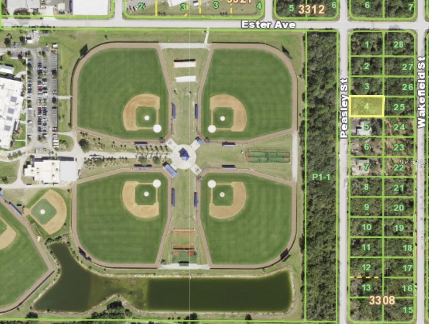 A building site (currently zoned as OMI). No CDD, No HOA, No deed restrictions, currently not in a scrub jay zone, good site elevation, and the site is just behind Tampa Bay Rays spring training camp. Newer constructions on the street and there are many single family homes.