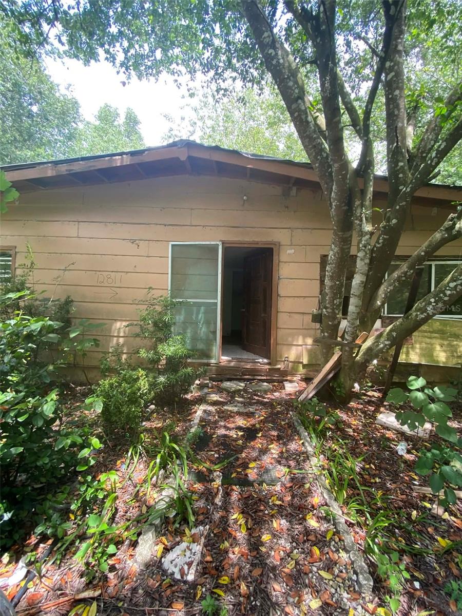 Property located in Belleview! Selling for the value of the land, tear down needed. The property includes multiple existing structures, that will need removal. This is a true investor special, ideal for buyers looking to redevelop, or repurpose the property. Sold as-is. Bring your vision. A member/manager of the owning LLC is a licensed real estate agent.