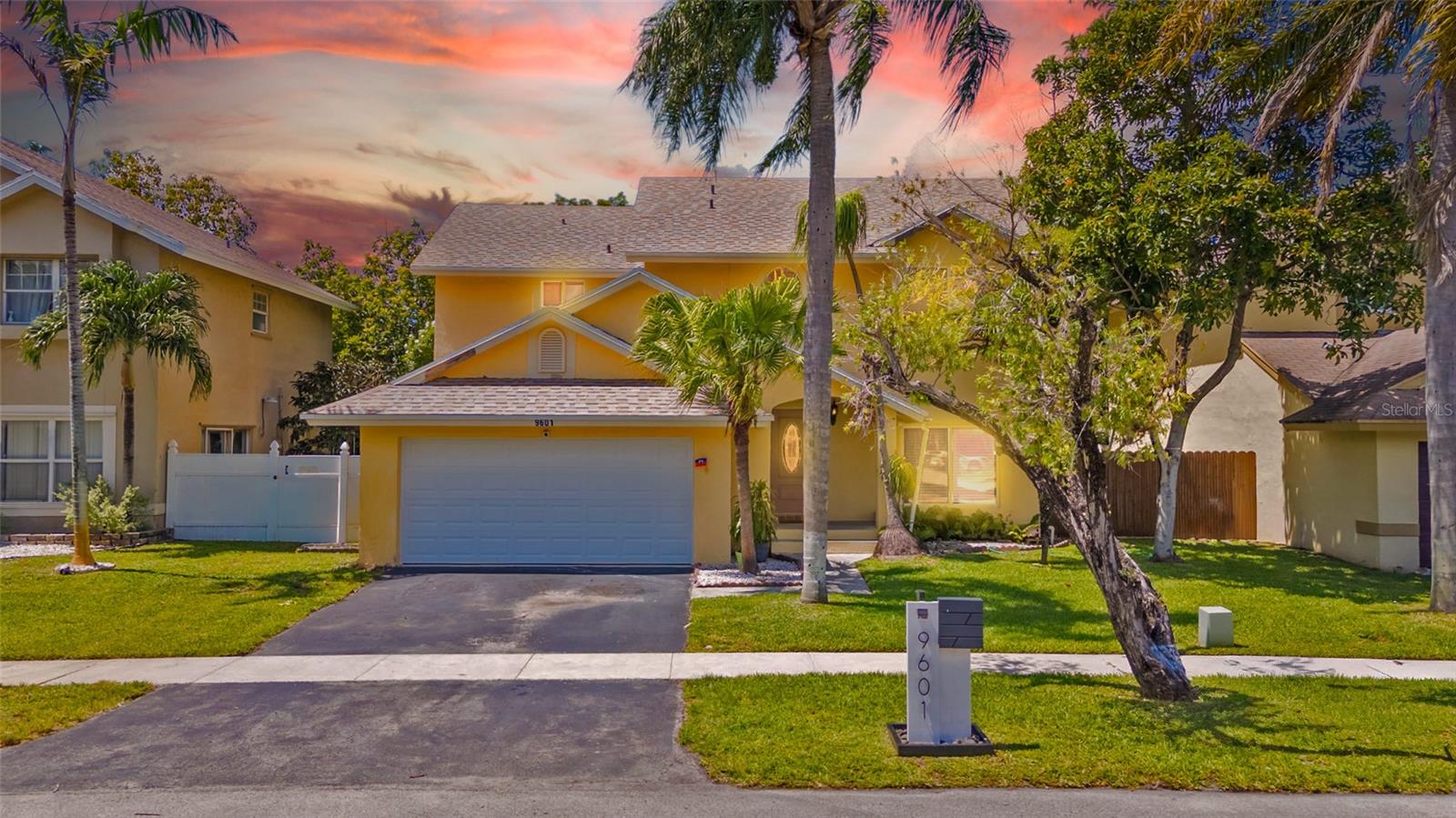Welcome home to this beautifully maintained two-story residence located in the highly sought-after Lakeside South community, where comfort, style, and convenience come together. From the moment you arrive, you'll appreciate the inviting curb appeal, newer roof, mature landscaping, soaring two-story entryway, and spacious layout designed for both everyday living and entertaining.

Step inside to discover bright open living spaces filled with natural light, beautiful flooring throughout, updated bathrooms, and a remodeled kitchen featuring updated cabinetry, granite countertops, stainless steel appliances, decorative backsplash, and generous space for gathering with family and friends. The dramatic foyer, expansive living areas, and thoughtful updates create a warm and welcoming atmosphere throughout the home.

Retreat to the spacious primary suite offering beautiful wood flooring, generous closet space, and a beautifully remodeled bathroom featuring modern finishes designed for comfort and relaxation. Additional updated bathrooms provide style and functionality throughout the home.

Located in the desirable Lakeside South community, enjoy sidewalks, fruit trees, and a neighborhood loved for its central location and community feel. Conveniently located near Pembroke Lakes Mall, Pembroke Gardens, restaurants, parks, schools, and entertainment, with easy access to Pines Boulevard, I-75, Florida's Turnpike, SR-826, and major commuter routes making travel throughout South Florida convenient.

Whether you're hosting family gatherings, entertaining guests, or simply enjoying quiet evenings at home, this property offers the space, comfort, and lifestyle you've been searching for.

More than a house—this is a place to create memories and truly feel at home.