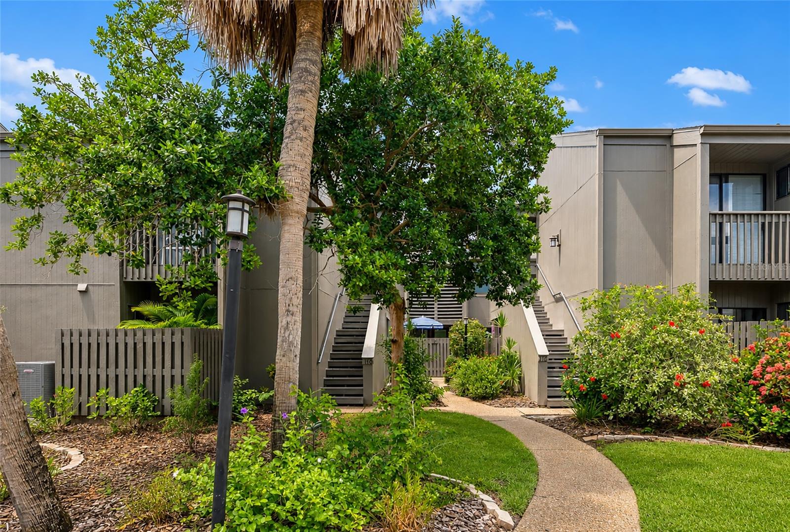 Bring your furniture and move right in to this popular Pine Run neighborhood.  No need to worry about remodeling this condo!  New coastal look ceramic tile throughout the entire home! New kitchen and appliances, new guest bathroom, new doors throughout, new light fixtures, and newly painted. Wow!  First floor condo offers more outdoor living space.  The patio off the main entry offers privacy and has access from the dinette area.  A spacious center atrium feels like a peaceful retreat.  The main covered lanai off the living room and dining room is screened in with a door to the back yard.  Each bedroom has it’s own small patio with privacy fence.  Kitchen is nicely equipped with washer and dryer in the dinette closet area.  The hallway has large almost floor to ceiling windows looking onto the center atrium for a very open feel.  Pine Run is an active community nestled between mature landscaping and trees, with many activities including pickleball, tennis, kayak storage and two swimming pools!  Launch your kayaks in the Blackburn Point Park and boat launch just down the road.  Pine Run is conveniently located near shopping, restaurants, major roads and Casey Key Fish House and Tiki Bar.  Sarasota is about 13 miles away, Venice about 7 miles.  Area beaches are close at hand with Nokomis Beach just 5 miles and Siesta Key Beach is 9 miles.  You are in the heart of paradise! Come see for yourself!