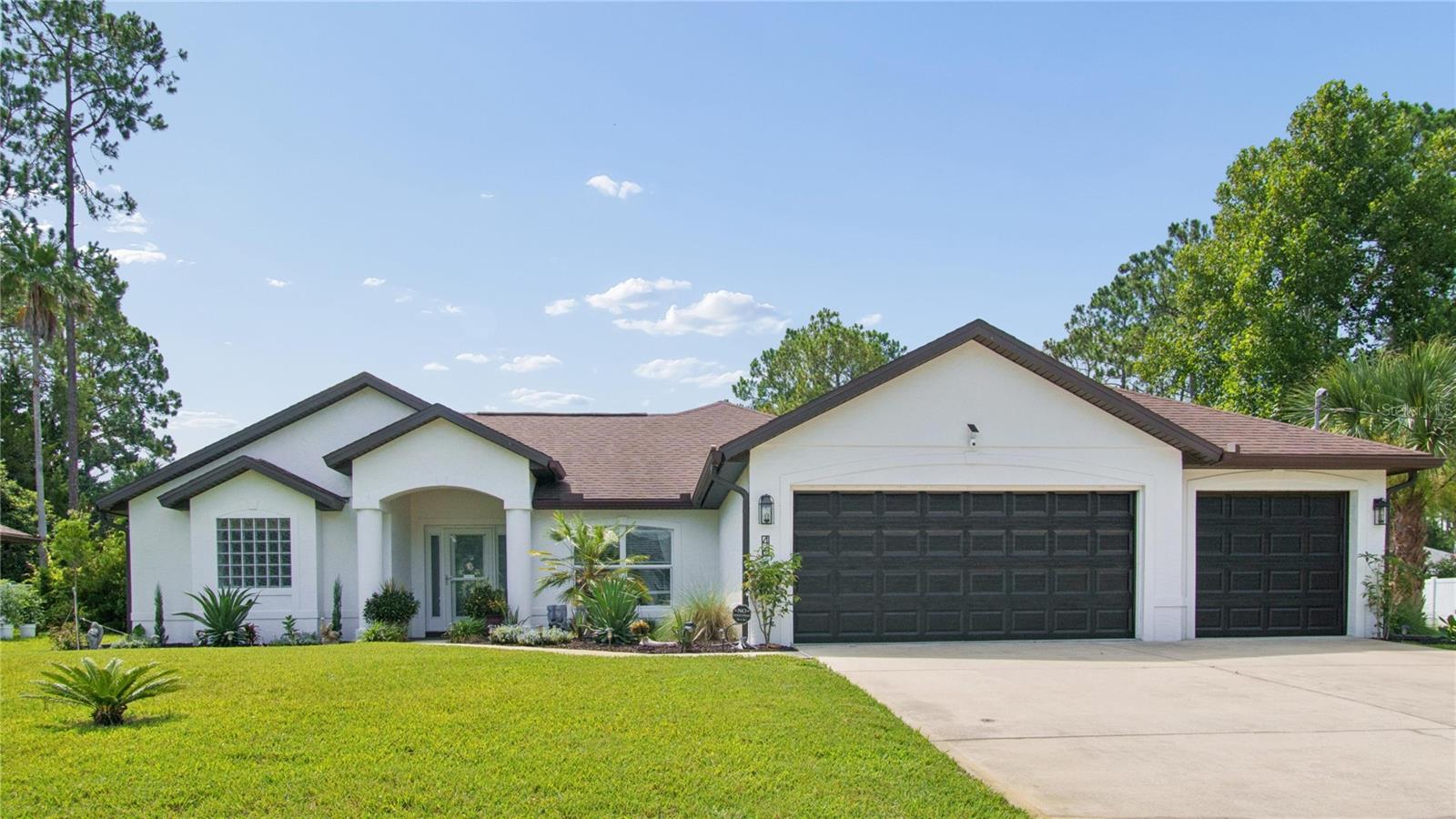 This charming 2015 build has had recent updates with new paint, landscaping, Irrigation from the private Well, gutters, privacy fence and patio pavers included are both the fireplaces. Nestled on the dry side of Belle Terre, X flood zone. As you step inside, you'll find a split home layout with the master suite on one side of the home and three beds on the other side. The three-car garage and a 10 x 16 shed in the back gives you ample space for parking and storage. Whether you're looking to enjoy the nearby parks, trail system, or a 15 min drive to the ocean to explore the vibrant community 46 Brooklyn Ln. All Furnishings are negotiable and the seller is a licensed realtor.