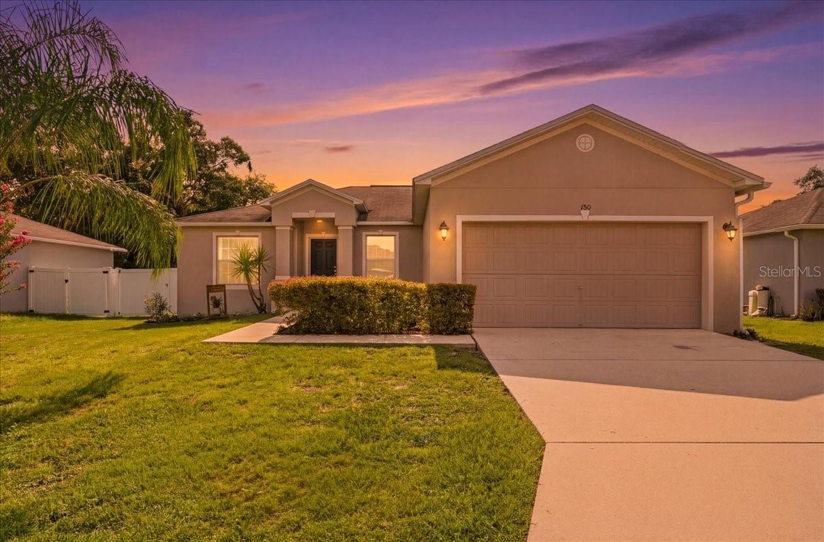 Welcome home to this beautiful 3-bedroom, 2-bath home located in the gated community of Solis Gardens comprised of 61 homes. Built in 2018, this home offers modern construction, comfortable living spaces, and energy-conscious features designed for everyday convenience.
Inside, you’ll find a functional layout with inviting living areas, a split bedroom plan, and a seamless flow that makes the home easy to enjoy. The private owner’s suite features a spacious bathroom with a large walk-in shower and soaking tub, creating a comfortable retreat at the end of the day.  The A/C was serviced and has also had a UV light added to keep bacteria and germs at bay.  The fenced backyard provides added privacy and usable outdoor space, perfect for relaxing, entertaining, pets, or simply enjoying Florida living.  Also, if you enjoy gardening, you'll love the beautiful flowers that are growing as well as the use of the raised planting beds.  One of the standout features of this home is the solar panel system, which helps keep monthly utility costs impressively low. The sellers pay a connection fee, along with a low solar payment for easy budgeting.  The neighborhood offers a tucked-away feel with its gated entrance and limited number of homes, while still being close to everyday conveniences. Enjoy easy access to LEGOLAND, restaurants, medical facilities, schools, shopping, and the beautiful Chain of Lakes.  If you’re looking for a newer home with a fenced yard, solar savings, and a welcoming community setting in a convenient Central Florida location, this one is a must-see.  No CDD!