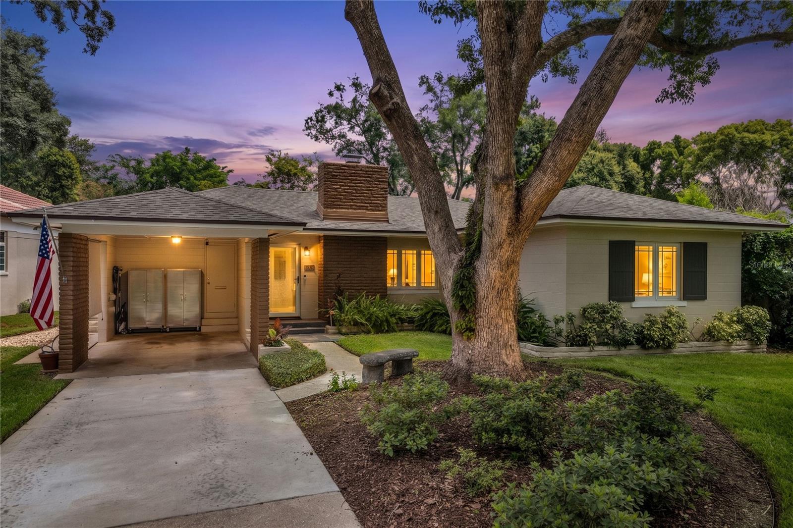 Virtually Staged. Welcome to this stunning lakefront retreat on Lake Emerald, perfectly positioned on a quiet street between the highly sought-after Delaney Park and Bel Air neighborhoods. Situated on a beautifully landscaped .29-acre lot, this thoughtfully updated home is completely move-in ready and offers the perfect blend of timeless charm, modern upgrades, and an unbeatable Downtown Orlando lifestyle. From the moment you arrive, you'll appreciate the home's inviting curb appeal, mature landscaping, and covered carport complete with an electric vehicle charger. Inside, an open, light-filled floor plan showcases beautiful hardwood floors, abundant natural light, and breathtaking views of Lake Emerald. The spacious living room is anchored by a cozy gas-burning fireplace, while the adjoining dining area creates an ideal space for everyday living and effortless entertaining. The well-appointed kitchen features wood cabinetry, stainless steel appliances, a gas cooktop, pendant lighting, and bar seating perfect for casual dining. Additional conveniences include an indoor laundry room, a generous pantry/storage room, office space, and a convenient half bath for guests. Relax and unwind on the screened porch, where peaceful lake views create the perfect backdrop for morning coffee or evening gatherings. Step outside to the open patio, an ideal spot for a fire pit and outdoor entertaining, all while enjoying the privacy and tranquility of your serene waterfront setting. This home has been meticulously maintained and thoughtfully updated with a 2022 roof, updated plumbing, double-pane windows, irrigation system, and security system, providing peace of mind for years to come.
Enjoy one of Orlando's most desirable lifestyles with the ability to walk to Lake Davis, Mills Market, Thornton Park, and Delaney Park's baseball fields, tennis courts, and playground. You're also just a short bike ride from Downtown Orlando, the Hourglass District, Dr. Phillips Center for the Performing Arts, Orlando Health, and countless dining, shopping, and entertainment destinations. Zoned for Lake Como K-8 and Boone High School, this is a rare opportunity to own a beautifully updated lakefront home in one of Orlando's most coveted neighborhoods.