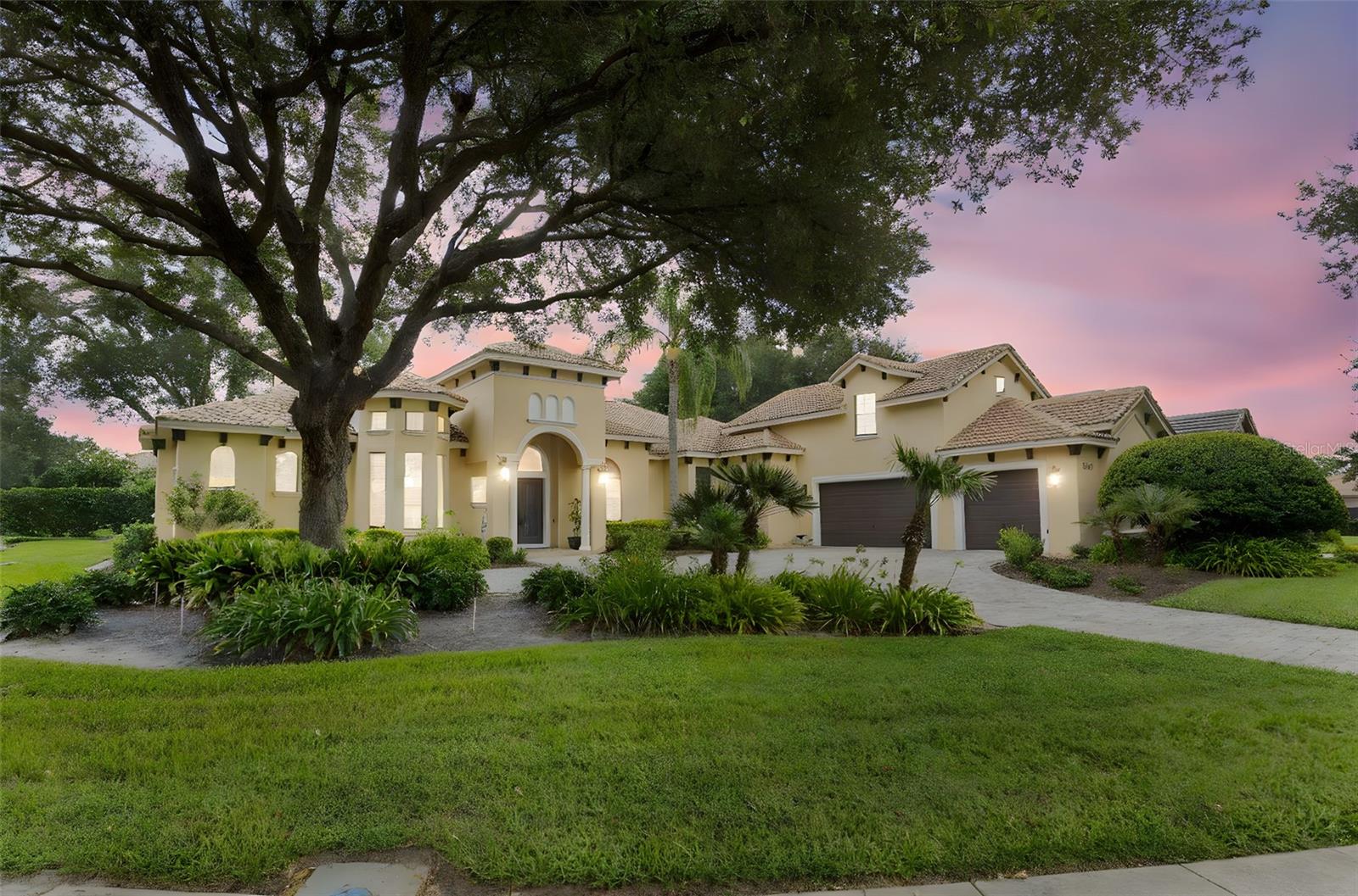 MOTIVATED SELLER. PRICED BELOW APPRAISED VALUE. Seller offering up to $25,000 toward the buyer's closing costs. Experience exceptional craftsmanship and resort style living in this custom built 5 bedroom, 4 full bath, 2 half bath residence located within the gated golf community of RedTail. Offering 4,593 square feet of thoughtfully designed living space, this home showcases timeless quality with real hardwood flooring in formal areas, 8 foot interior doors, plantation shutters, extensive crown molding, detailed solid wood trim, and granite countertops throughout. Designed for both everyday living and entertaining, the gourmet kitchen features 42 inch cabinetry, a large center island, stainless steel appliances, natural stone backsplash, a walk in pantry, and a dedicated wet coffee bar. A striking see through gas fireplace connects the main living spaces, creating warmth and architectural character. Additional features include a private home office with custom built ins and a dedicated home theater. The luxurious primary suite serves as a private retreat with 12 foot tray ceilings and separate his and her walk in closets. Most of the home's furniture is included, making this a truly turnkey opportunity where you can move in and immediately begin enjoying the luxury lifestyle. Step outside to your own backyard oasis where a screened lagoon style pool, mature landscaping, and complete privacy create the perfect setting for relaxation. Entertain with ease from the outdoor kitchen featuring granite countertops and a stainless steel oven. Residents of RedTail enjoy championship golf, dining, fitness and spa amenities, Har Tru clay tennis courts, scenic walking trails, and golf cart friendly streets. Conveniently located near downtown Orlando, major highways, shopping, dining, and Central Florida attractions, this community offers luxury living with everyday convenience. Current annual insurance premium is $3,563, and current property taxes are $7,706. One or more pictures have been virtually staged.