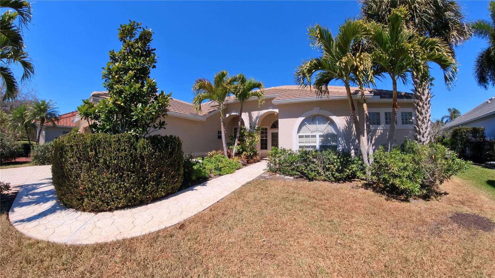 Welcome to a place where life slows down and every day feels a little easier.

Nestled along the fairways within the welcoming community of Gateway Greens, 11837 Grand Isles Lane offers the kind of peaceful Florida lifestyle many dream about — warm sunshine, quiet mornings, and beautiful golf course views just beyond your lanai.

Designed for comfort and simplicity, this home features an open, airy layout with heigh ceilings that create a sense of space and calm the moment you walk inside. Neutral finishes and easy-care flooring throughout make everyday living effortless, allowing more time to enjoy the things that matter most — morning walks, afternoon golf, and evenings spent relaxing with friends and family.

The oversized screened lanai becomes a natural extension of the home, perfect for morning coffee as the day begins or unwinding at sunset while enjoying the gentle Florida breeze. Whether you are escaping colder winters or settling into a full-time Florida lifestyle, this home offers comfort without complication.

Recent updates, including a new roof in 2024 and plumbing re pipe in 2025, provide peace of mind so you can focus on enjoying your new chapter rather than worrying about maintenance.

Gateway is known for its friendly atmosphere and convenient location, placing restaurants, shopping, spring training at Fenway South, Fort Myers Brewing Company, and RSW International Airport just minutes away. The upcoming Commons Park will add even more opportunities for recreation, connection, and community gatherings.

This is more than a home — it’s a lifestyle centered around ease, connection, and enjoying Florida at your own pace.

Come experience the comfort and simplicity of Gateway living.