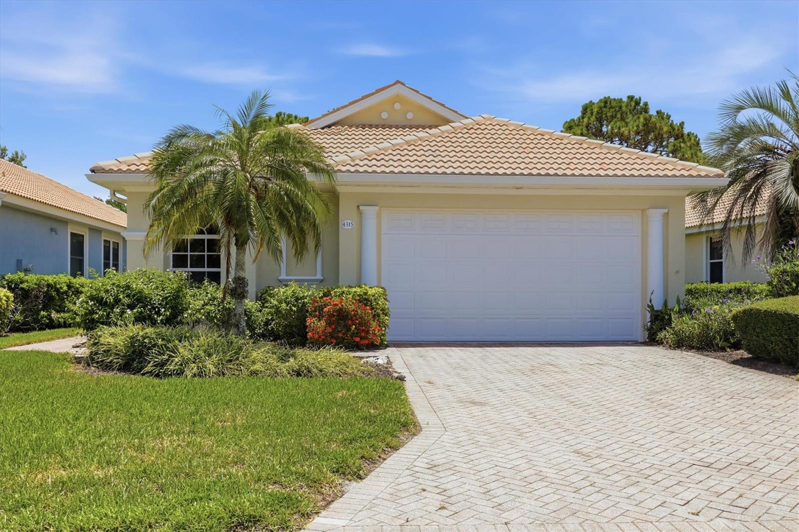Tucked within a secure gated enclave in Sarasota’s highly desirable 34233 area, this beautifully reimagined Spanish Mediterranean residence blends timeless architecture with a refined, modern interior designed for effortless coastal living.

A classic tile roof and elegant exterior detailing set the tone for what awaits inside—soaring ceilings and thoughtfully designed tray accents create a sense of volume and light throughout the home. The open-concept layout has been fully transformed to meet today’s lifestyle expectations, offering seamless flow between the main living spaces while still preserving a sense of warmth and sophistication.

At the heart of the home, the chef-inspired kitchen showcases rich wood cabinetry, brushed brass fixtures, and a clean, elevated design that pairs beauty with functionality. A dedicated dining area provides the perfect setting for both intimate dinners and effortless entertaining.

The spacious primary suite serves as a private retreat, complete with a well-appointed en-suite bath featuring dual vanities and a generous walk-in closet. Secondary bedrooms are notably oversized, offering flexibility for guests, family, or dedicated work-from-home spaces.

Designed for low-maintenance living, the HOA maintains the general area landscaping, allowing more time to enjoy the lifestyle this location is known for. An attached two-car garage adds everyday convenience and storage. There is also a screened-in back porch where you can spend your quiet time, as the home backs onto preserved land, so you can enjoy your privacy with no neighbors at the back to worry about.

Perfectly positioned less than 8 miles from the world-renowned Siesta Key Beach, consistently ranked among the best beaches in the United States, this home offers the rare combination of architectural charm, modern updates, and unbeatable proximity to Sarasota’s most coveted coastal experiences.

A true lock-and-leave opportunity where elegance, comfort, and location come together in one exceptional offering.