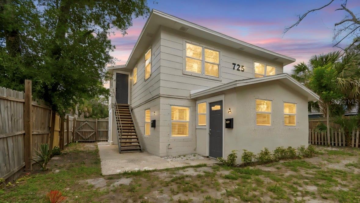 St. Pete Duplex with Strong Income Potential! This fully renovated (2026) two-story property offers an excellent opportunity for both investors and owner-occupants—live in one unit and rent the other, or maximize cash flow by leasing both.
Each unit features 2 bedrooms and 1 bathroom with approximately 750 sq. ft. of living space. The property is now fully occupied , presenting immediate upside unit A is rented for $1650  per month and unit an is rented for $1600 per month giving you $3250 per month X 12 months gives you $39,000 in annual gross income.
Ideal for owner-occupants, this property presents a great house-hacking opportunity—buyers may be able to utilize FHA or VA financing, live in one unit, and offset their mortgage by renting out the other unit (buyer to verify loan eligibility and requirements).
Unit A (downstairs) offers laminate wood flooring throughout (with tile in the bathroom), an open-concept layout, updated kitchen with granite countertops, an eat-in area, and a spacious living room, plus a versatile den or bonus space. Unit B (upstairs) features a similar layout with luxury vinyl flooring in the main living areas and bedrooms, and tile in the kitchen and bath.
Both units include granite countertops, ceiling fans, mini blinds, and their own stackable washer and dryer for added convenience.
Exterior highlights include new fencing, including a front privacy fence that enhances curb appeal and creates a more secluded feel. Ideally located just off 9th St. S, the property is minutes from Downtown St. Petersburg, Tropicana Field, and the USF campus. Bartlett Park and the Frank H. Pierce Recreation Center are just steps away.
With strong rental demand in the area and excellent proximity to major amenities, this duplex is a prime opportunity to generate steady income and long-term value.
