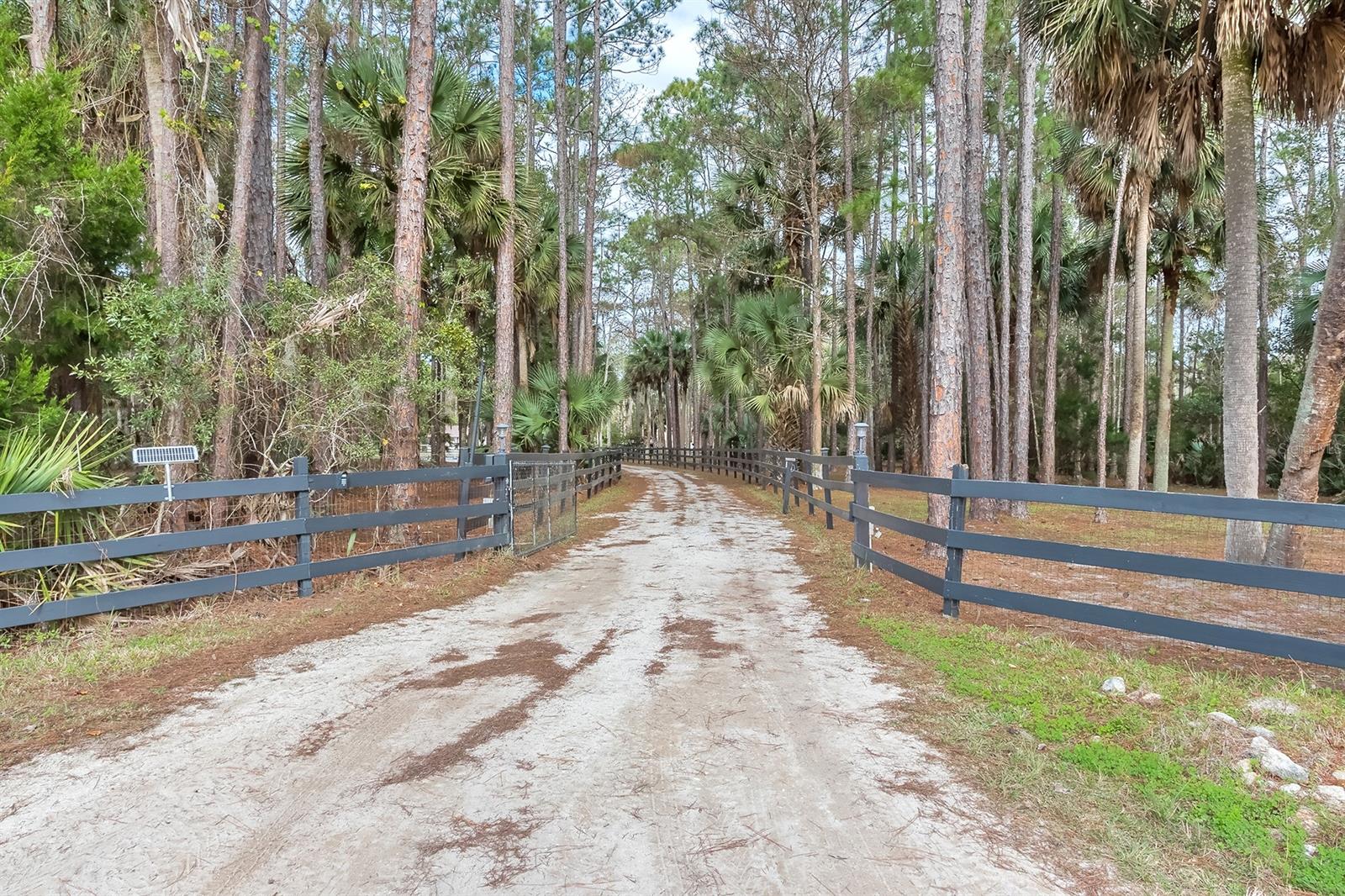 Bring the horses, kids and all the toys to this completely updated pool home on 5 fenced acres! 4 Bedrooms, 3 Baths, 2 Owners Suites, Wood Burning Fireplace, Vaulted Ceilings, 2 Car Garage attached plus Two detached workshops. Sparkling Pool with Screen Enclosure. New Metal Roof and windows 2017, New Water softener system 2021, New AC 2020, New smart Hot water heater 2020, all new wood plank tile throughout the main living areas of home, all 3 bathrooms have been updated, all New appliances and New granite countertops in the kitchen with backsplash. Brand New 40x30 workshop with concrete pad, electric , AC, post lift, 3 roll up doors to fit all the toys, boat or RV.  You will also find a second 2 story workshop with electric that could easily be converted into a mother in law suite.  The acreage features a 3 stall barn with electric and water and 2 separate fenced pastures for the horses.  You must see this one in person to appreciate all it has, call today to schedule your private showing.