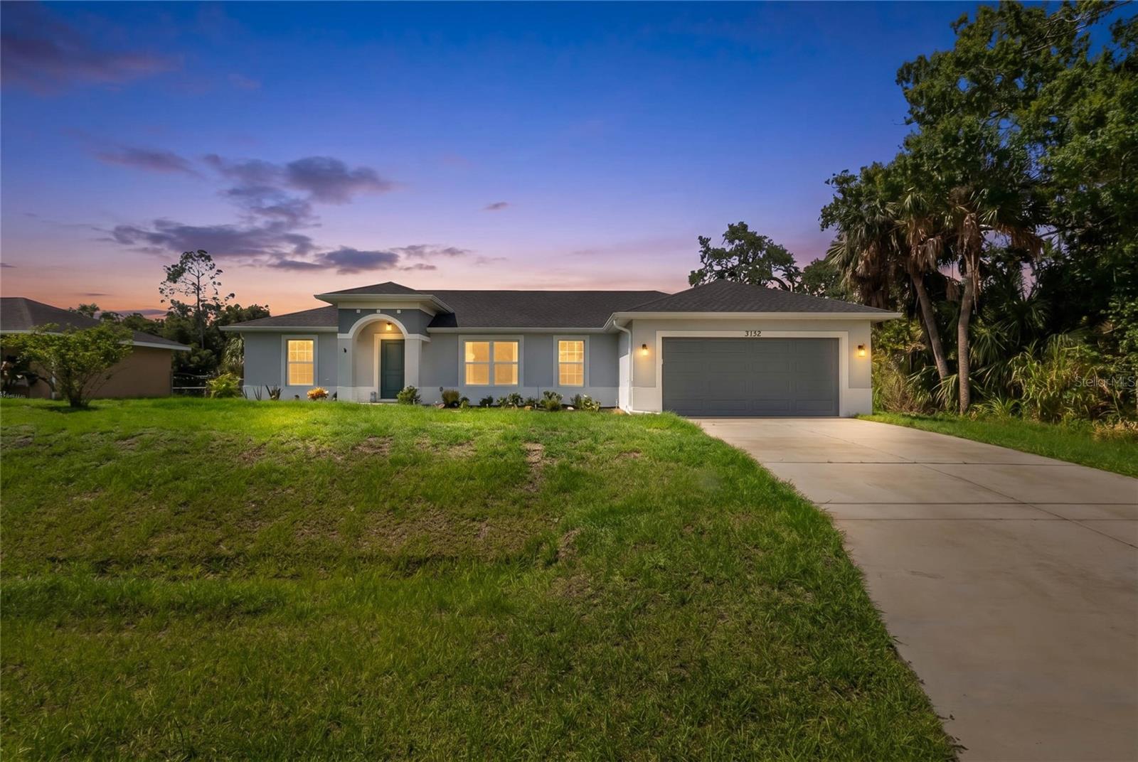 This 2023 built home Spans 1,574 sqft and features an open concept split floor plan with 3 bedrooms, 2 bathrooms, laundry room and a 2 car garage. All finishes were carefully planned such as the LVP floor, White Quartz tops, Kitchen Island and Expanded Rear Lanai. Wainscoting and Crown Moulding are just a few details that add to the overall allure making this home a standout. If you are looking for a home that does not look like all the others then this home is for you. New home quality without the wait.