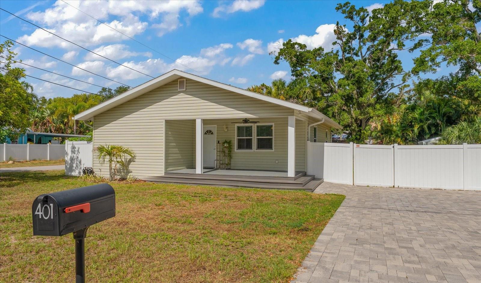 This large corner lot in the coastal golf cart community of Ozona, is just a one-minute walk to Ozona Elementary and the Pinellas trail. Also zoned for A rated Palm Harbor Middle and Palm Harbor University High School, this sought after location offers a wide variety of options for local dining and entertainment. You can park your car and drive your golf cart to hear local music or have dinner with the family.  The owners favorite feature is how much distance she has from the neighboring homes.  The large pavered driveway can house 4-6 vehicles, and the large double gate on the lime street side allows access for boat or RV parking. This home was fully renovated down to the studs in 2019 / 2020 with a brand-new roof, HVAC, hot water heater, electrical, plumbing and all new interior finishes.   The owner chose to have the foundation fully renovated to ensure long term stability and peace of mind. The transferable 25-year warranty still has 20 years left and comes with the purchase.  A newer high end metal shed is included in the sale of the home where you can store your bikes, kayaks or riding mower.  The properties across the street to the east and south are both flood zone x making this the perfect location for safety during storms. Not a drop of water from the hurricanes came anywhere near this property or the surrounding streets.  Won’t last long so don't wait to see this little gem before it is snatched up.