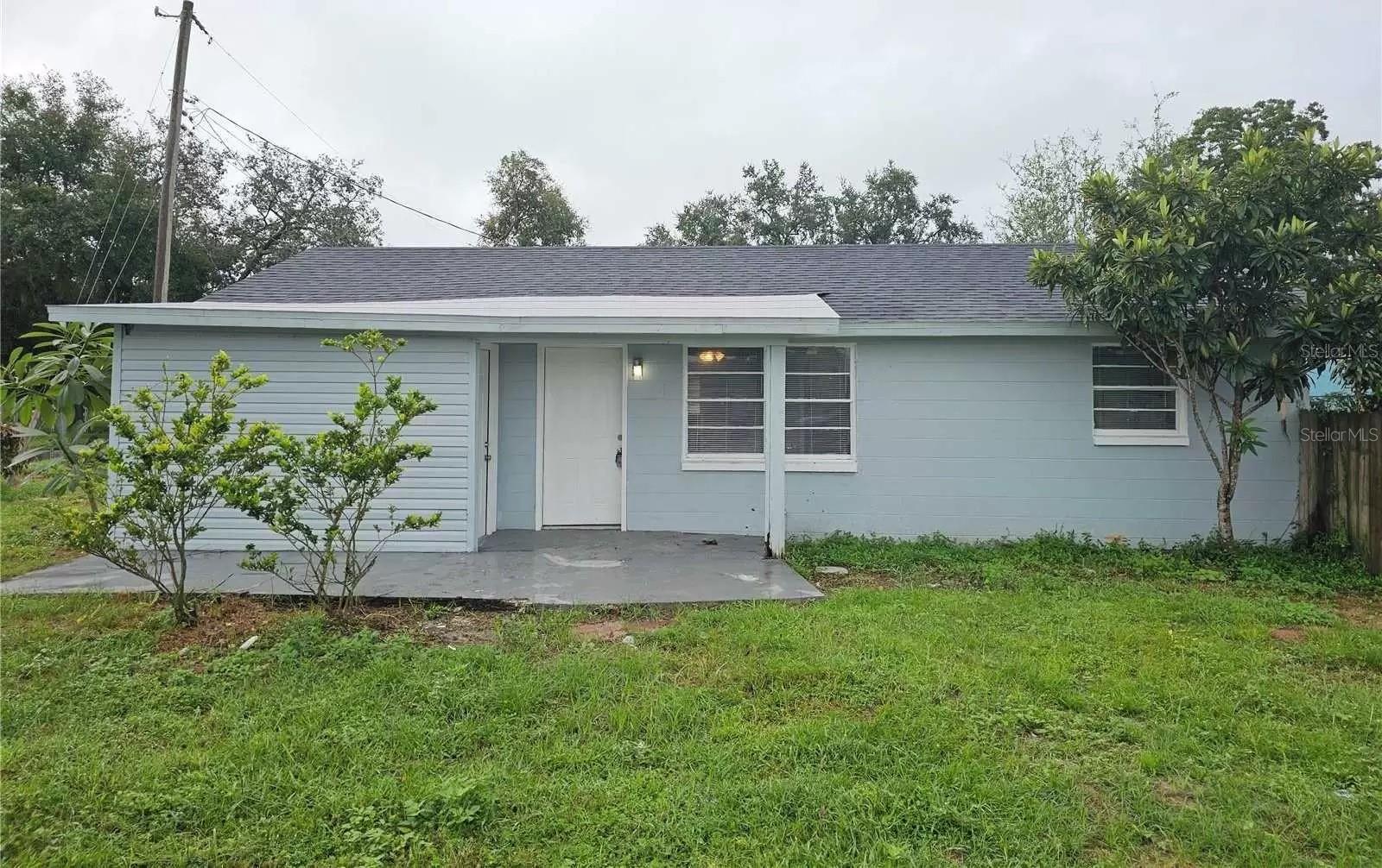 Calling all CASH investors! Tenant occupied till 3/31/2027 @ $1565/mo  ------READ REALTORS NOTES!----- No HOA and no water bill since you're on a well! Located in the charming community of Winter Haven, this beautifully updated home sits on a large corner lot, offering a peaceful country retreat feel with serene views of nearby pasture land. No flood zone to worry about here, so enjoy peace of mind for years to come. With a new roof installed in 2022 and a recently upgraded AC unit, all the big-ticket items are already taken care of for you. Inside, you'll find modern finishes with shiplap ceilings and durable laminate flooring that flow seamlessly throughout, combining style and low-maintenance living. The kitchen boasts sleek stainless steel appliances, including a vent hood, and granite countertops. One of the home’s standout features is the expansive, fully fenced-in yard, offering endless possibilities for gatherings, gardening, or soaking up the Florida sunshine. You'll also appreciate the extra space provided by the large laundry and storage room. You're just minutes from local amenities like golf courses, schools, parks, premium coffee shops and more, with the added bonus of being less than an hour from the magic of Disney World! No hurricane damage!  Property has a code violation with the city that a buyer would need to remedy. Details in realtors notes.