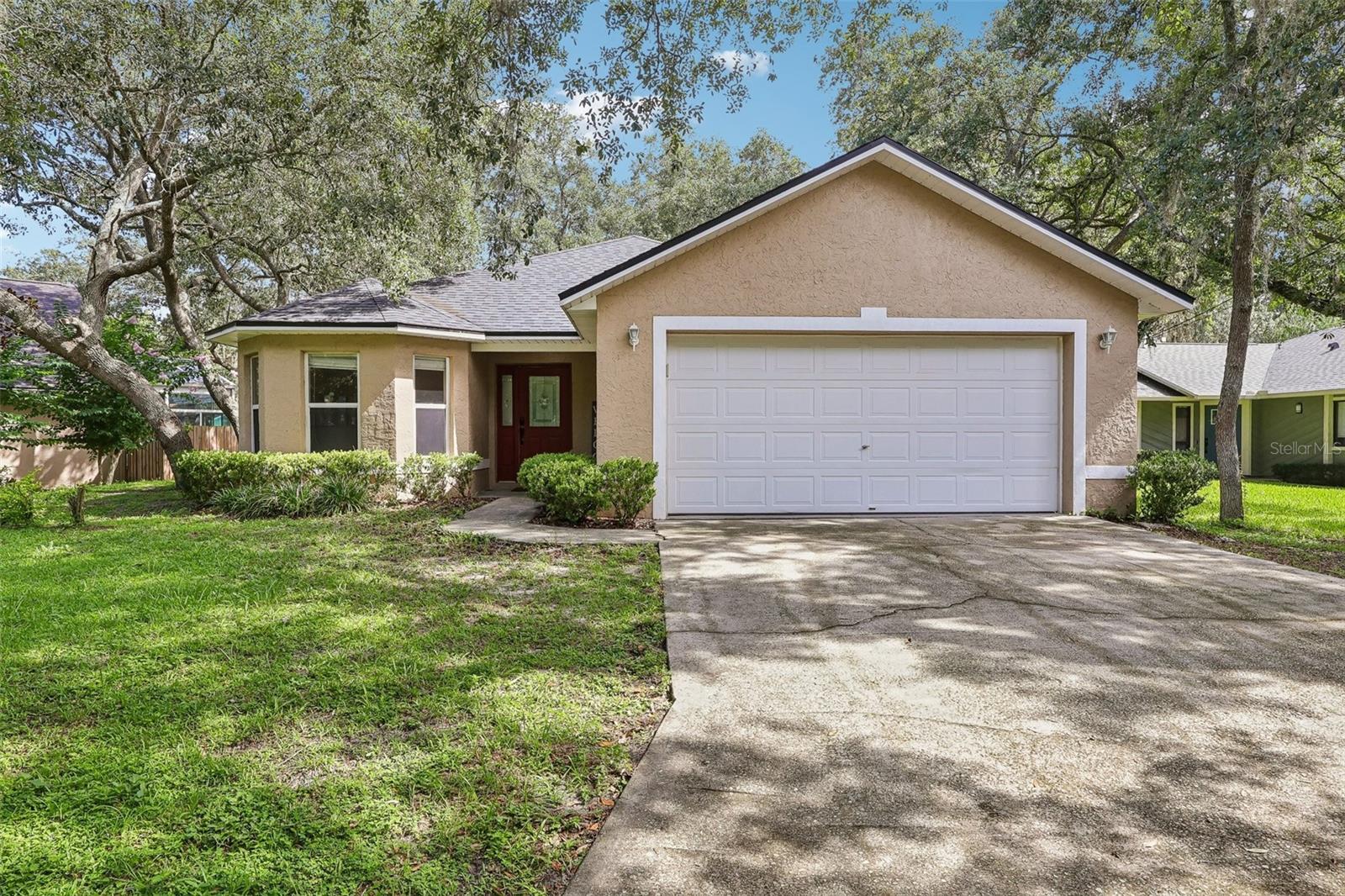 Welcome home to this beautifully maintained 3-bedroom, 2-bath residence nestled on a picturesque lot in the desirable North Orlando Ranches community. Offering the freedom of no HOA, this move-in-ready home combines comfort, style, and an unbeatable location.
Step inside to discover a bright, open floor plan highlighted by vaulted ceilings, a charming bay window in the dining room, and a modern kitchen designed for both everyday living and effortless entertaining. Throughout the home, you’ll find no carpet—only attractive ceramic tile and laminate flooring for easy maintenance.
The spacious primary suite features a walk-in closet and a private ensuite bathroom complete with a large walk-in shower. An inside laundry room adds convenience with a utility sink and additional storage space.
Relax year-round in the air-conditioned Florida room, where French doors open to a peaceful, shaded backyard—perfect for morning coffee, outdoor gatherings, or simply enjoying the natural surroundings.
Located within the highly acclaimed Seminole County Public School district, this exceptional home is just minutes from SR 434, shopping, dining, parks, and entertainment, making commuting and daily errands a breeze.
Don’t miss this wonderful opportunity to own a move-in-ready home in one of Winter Springs’ most desirable locations. Schedule your private showing today!