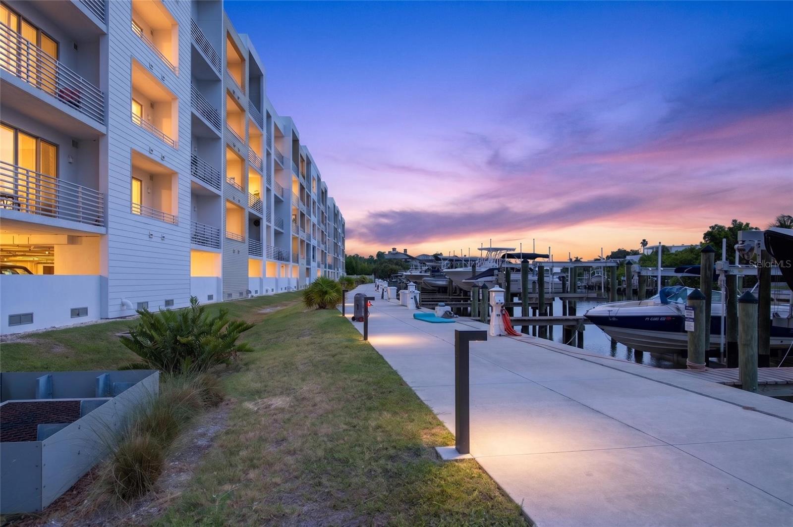 Location. Lifestyle. Luxury. This waterfront gem truly has it all!
Experience luxury waterfront living in this beautifully appointed 1-bedroom, 2-bath condominium with a versatile den that's perfect for a home office or guest space. Ideally positioned to capture tranquil canal and bay views, this exceptional residence offers the perfect blend of comfort, style, and an convenient Sarasota location.

The open-concept floor plan seamlessly connects the living room, dining area, and kitchen, creating an inviting space for both everyday living and entertaining. The well-appointed kitchen features sleek quartz countertops, stainless steel appliances, and a convenient breakfast bar. Step outside onto the private balcony and unwind while enjoying the peaceful waterfront views.

Additional features include a stackable washer and dryer, generous storage, and a deeded, under-building covered parking space.

This gated community offers resort-style amenities, including a heated swimming pool, clubhouse with fitness center, fire pit, dog park, and electric vehicle charging stations.

Located just minutes from vibrant downtown Sarasota, you'll enjoy easy access to shopping, fine dining, the renowned Van Wezel Performing Arts Hall, Island Park, St. Armands Circle, and the beautiful shores of Lido Beach.

Whether you're looking for a full-time residence, a seasonal retreat, or an investment opportunity, this property offers exceptional flexibility.