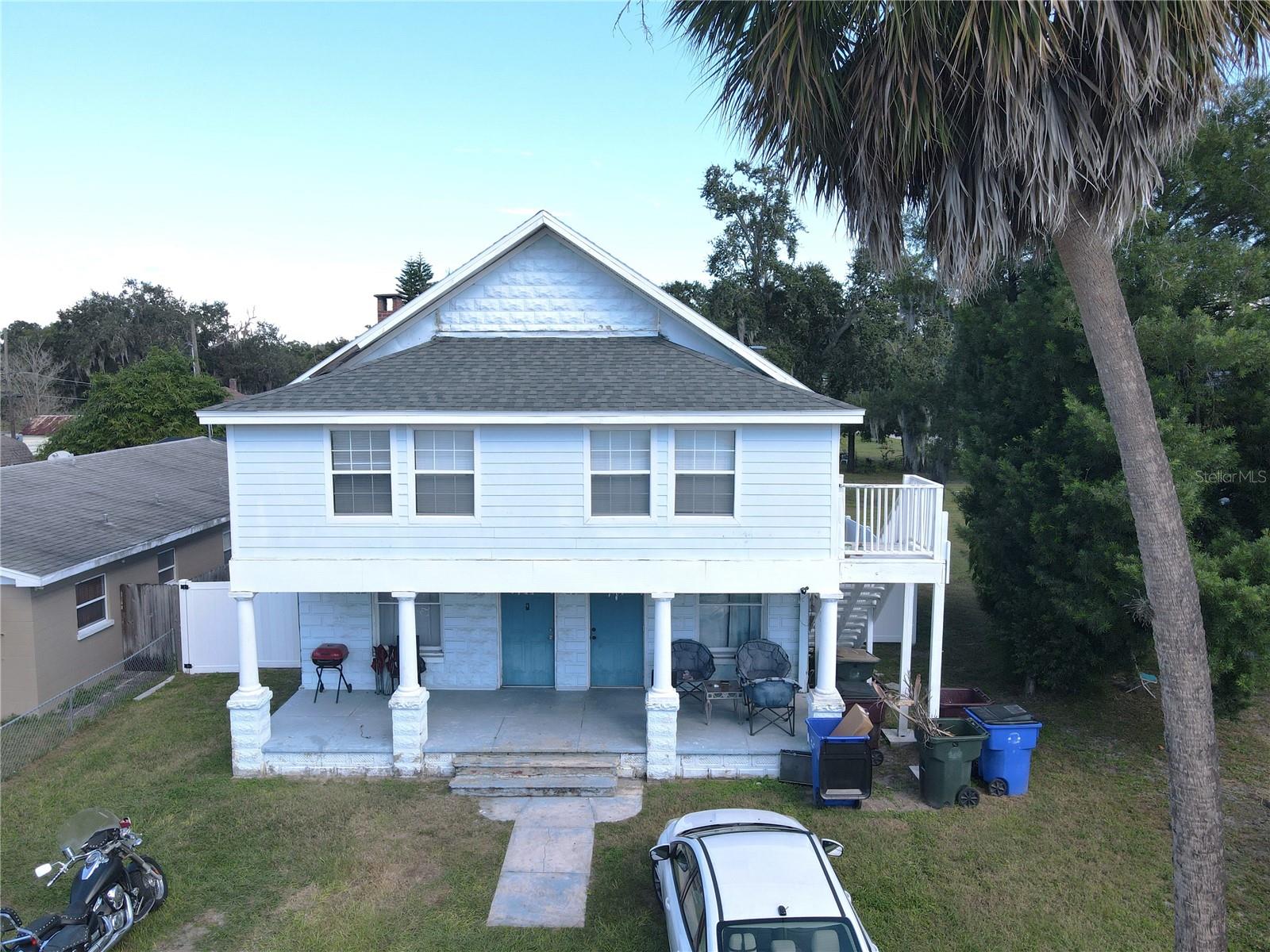 Nice two-story two-tenant income property. One unit downstairs, another unit upstairs. Two bedrooms, one bath in each unit. Construction is architectural concrete block. Both kitchens have new cabinets, with laminate counters. Both units have recent interior paint. Great big grassy back yard, fully fenced. Both tenants love it here, and would like to stay.