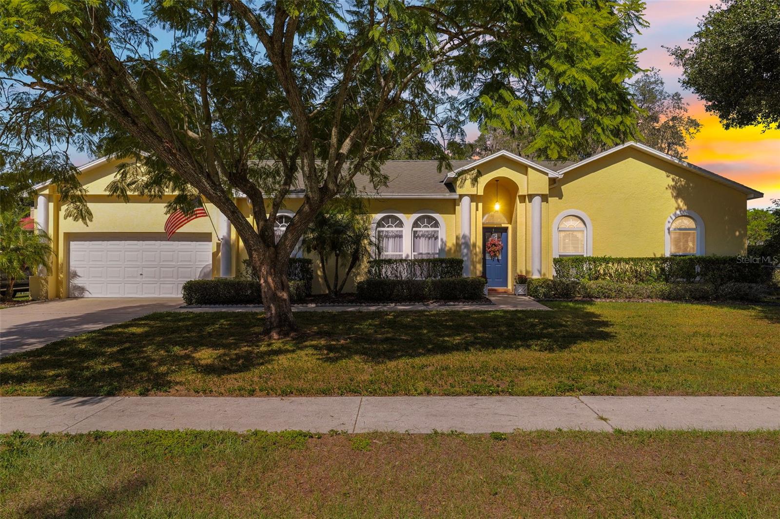 NEW ROOF ! NO PETS ,NO HOA, NON- SMOKER. ONE OWNER LOVED AND CARED FOR HOME. A beautiful established home with all the comforts of home. Since it was built in 1993, this Boyd Burley custom home has been in the family and loved by all. Split plan home. This home has large, spacious rooms. Several storage and closet spaces are available; including two sheds connected by a waterproof deck in the backyard. There is even a storage space in the attic. The property is wrapped in a cement wall  for privacy and is covered in Jasmin for it's floral scent and attractive appearance. An oasis of relaxation can be found in the backyard thanks to mature landscaping. The current owners enjoy the blue birds that visit the bird houses in the backyard. This home was updated originally for the Sellers; with high quality finishes. The Buyer of this home will benefit from the custom kitchen and newer appliances and all the open space this home provides. The living room and kitchen are open concept. The dinning room could easily be another living space and the small sitting room could be turned back into a dinning room or office space. Their all lots of options in this home. HVAC is 2 years old and comes with an app to run the thermostat while away from home. The home has a tankless water heater installed 2020, new garage door 2021, water softner with new tank paid for 2020, this is a split plan home. Laminate floors installed in 2020. There is a step down to the garage and a deep step to the sunroom. Home comes with a ring doorbell and security lights and cameras. The master bedroom has a walk in closet and the master bath has an additional walk in closet. NO POPCORN CEILINGS HERE! ALL CEILINGS HAVE BEEN REDONE. The kitchen is a newly installed custom kitchen with island and many custom cabinet features. Pull out shelves and a mixer lift. Lazy susan and a few glass front cabinets to display your most treasured pieces.
 Laundry room indoors. The washer and dryer do not convey. Dual sinks, tub, two walk-in closets, and ceiling fan are found in the master bedroom and en suite on the left side of the home. A French door with built-in blinds connects the master bedroom to the back porch. Except for a few bedrooms with carpet, the home has laminate floors. There are cement painted floors in the sunroom as well as double pane windows filled with argon gas to keep out the heat. A screen is available for every patio window. If you are interested in this beauty, we would appreciate your offers.