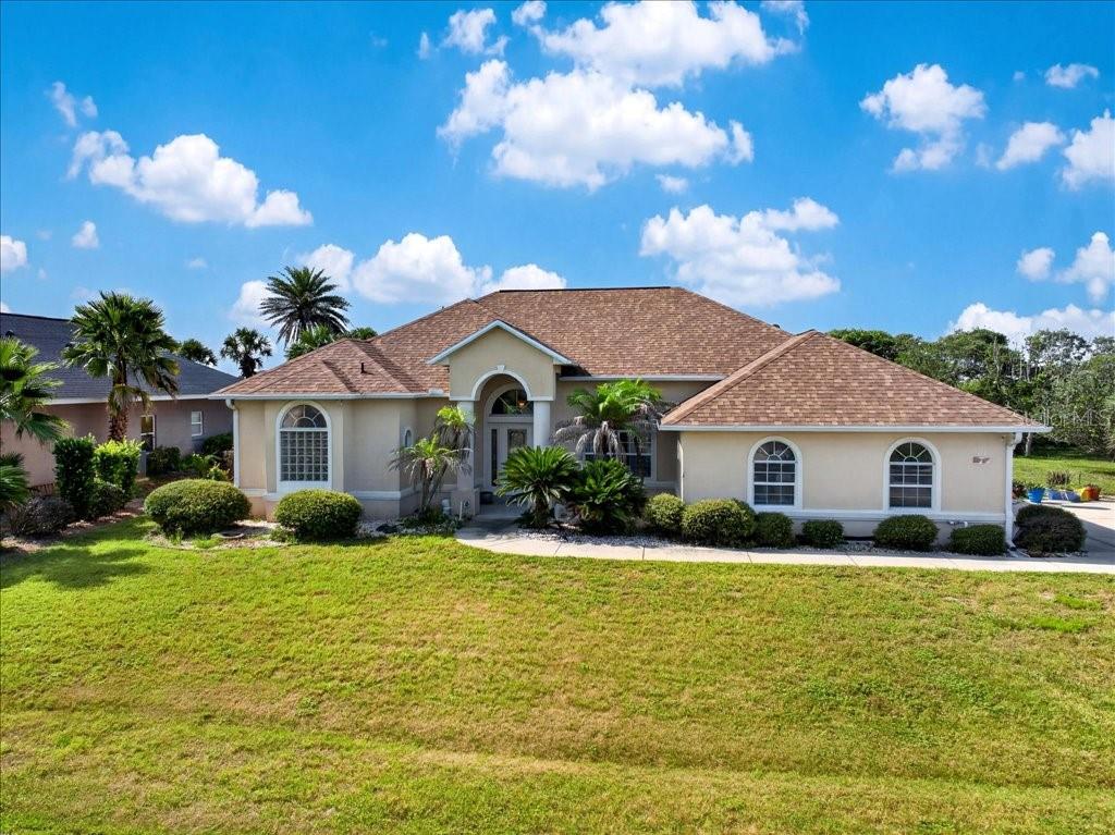Discover the joy of coastal living in this original-owner, custom-built masonry home, where calm tranquility and refreshing salt ocean breezes greet you daily. Nestled in the serene Hammock community, south of Marineland this rare and well-priced opportunity offers peaceful seclusion with deeded beach access and an Intracoastal Waterway easement featuring a covered dock and seating area.
This thoughtfully designed residence boasts an in-ground pool with lanai, copper wiring throughout, three bedrooms, two bathrooms, and a two-car garage. Elegant details include 4-inch crown molding, 11-foot tray ceilings, a gas fireplace, custom-built kitchen cabinetry with a dedicated coffee serving station, and bathrooms equipped with solid brass fixtures. Additional highlights feature a 2023 roof, custom-sized closets, and a 2026 refrigerator, microwave, and disposal.
Spanning approximately 1,947 square feet (GIS) on a spacious 0.3-acre lot (12,960 square feet), this home provides ample room for comfortable living. With its scarcity in today’s market, this window of opportunity to own in this desirable community is available now. Embrace the pleasant, unhurried lifestyle that awaits.