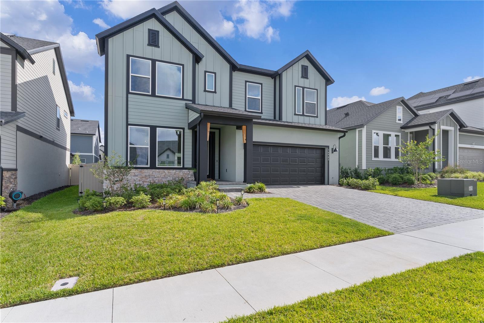 Assumable Loan at 5.99%. Welcome to 16983 Cedar Valley Circle, a stunning newly built residence nestled in the heart of Clermont, Florida. Constructed in 2025, this beautifully designed two-story home offers 4 bedrooms, 3 full bathrooms, a dedicated office or den, and over 2,525 square feet of thoughtfully crafted living space that perfectly blends modern elegance with everyday functionality.

From the moment you arrive, you’ll appreciate the home’s impressive curb appeal and contemporary design. Step inside to discover an open and inviting floor plan highlighted by soaring ceilings, abundant natural light, and upscale finishes throughout. The gourmet kitchen serves as the centerpiece of the home, featuring luxurious quartz countertops, upgraded 42” cabinetry, a built-in wall oven, sleek cooktop with designer hood, walk-in pantry, and ample preparation space ideal for entertaining and daily living.

The first floor also offers a spacious formal dining room perfect for gatherings, along with a versatile bedroom or office space and a full bathroom, creating an ideal setup for guests, remote work, or multigenerational living.

As you make your way upstairs, the elegant open-railing staircase with wrought iron balusters creates a dramatic architectural focal point while overlooking the spacious living area below. The second level features a generous loft space perfect for a media room, play area, or secondary family retreat. The primary suite provides a peaceful escape complete with an expansive ensuite bathroom showcasing dual vanities, an oversized walk-in shower, and a spacious layout designed for comfort and relaxation. Two additional bedrooms and another full bathroom complete the upstairs living quarters.

Step outside to enjoy the fully fenced backyard featuring an oversized covered patio, offering the perfect setting for outdoor dining, entertaining, or simply unwinding after a long day.

Residents of this exceptional community enjoy access to outstanding amenities including scenic walking trails, a dog park, pickleball courts, and a charming nature overlook with a cozy fire pit area.

Location is where this home truly shines. Conveniently situated just minutes from Publix, Costco, and Target, you’ll also enjoy the close proximity to the Clermont Chain of Lakes, vibrant Downtown Clermont, local restaurants, breweries, coffee shops, and the South Lake Trail with connectivity to Winter Garden. With easy access to the Florida Turnpike, Walt Disney World, and Orlando International Airport all within approximately 45 minutes, this home offers the perfect combination of luxury, convenience, and lifestyle.

Schedule your private showing today and experience everything this exceptional Clermont home has to offer.