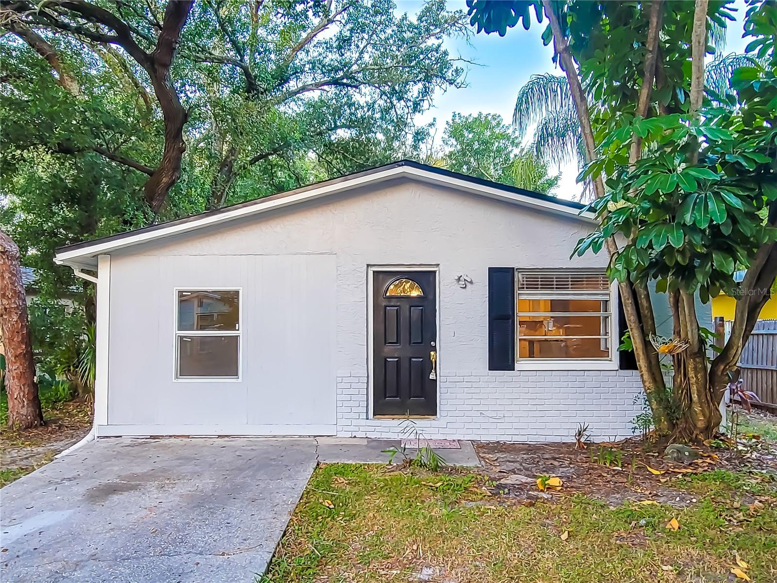 Another price reduction? YES! So schedule your appointment to see this property!  It has been completely remodeled with upgrades everywhere! If you have been saving it, hurry and schedule a showing before someone else realizes what a gem this one is!  This property is a RARE four-bedroom affordable house that is MOVE IN READY! Everything has already been done for you- Brand new kitchen with ALL NEW appliances! The bath has been completely remodeled and it's STUNNING! All new luxury vinyl flooring throughout the ENTIRE home! Fresh paint -Inside and out!! Roof was done in 2020! And to top it all off-a nice sized yard with a BRAND-NEW deck! Fantastic location with easy access to beaches, Tampa, and St Pete! You won't have to do a thing to make this place your home except move in!