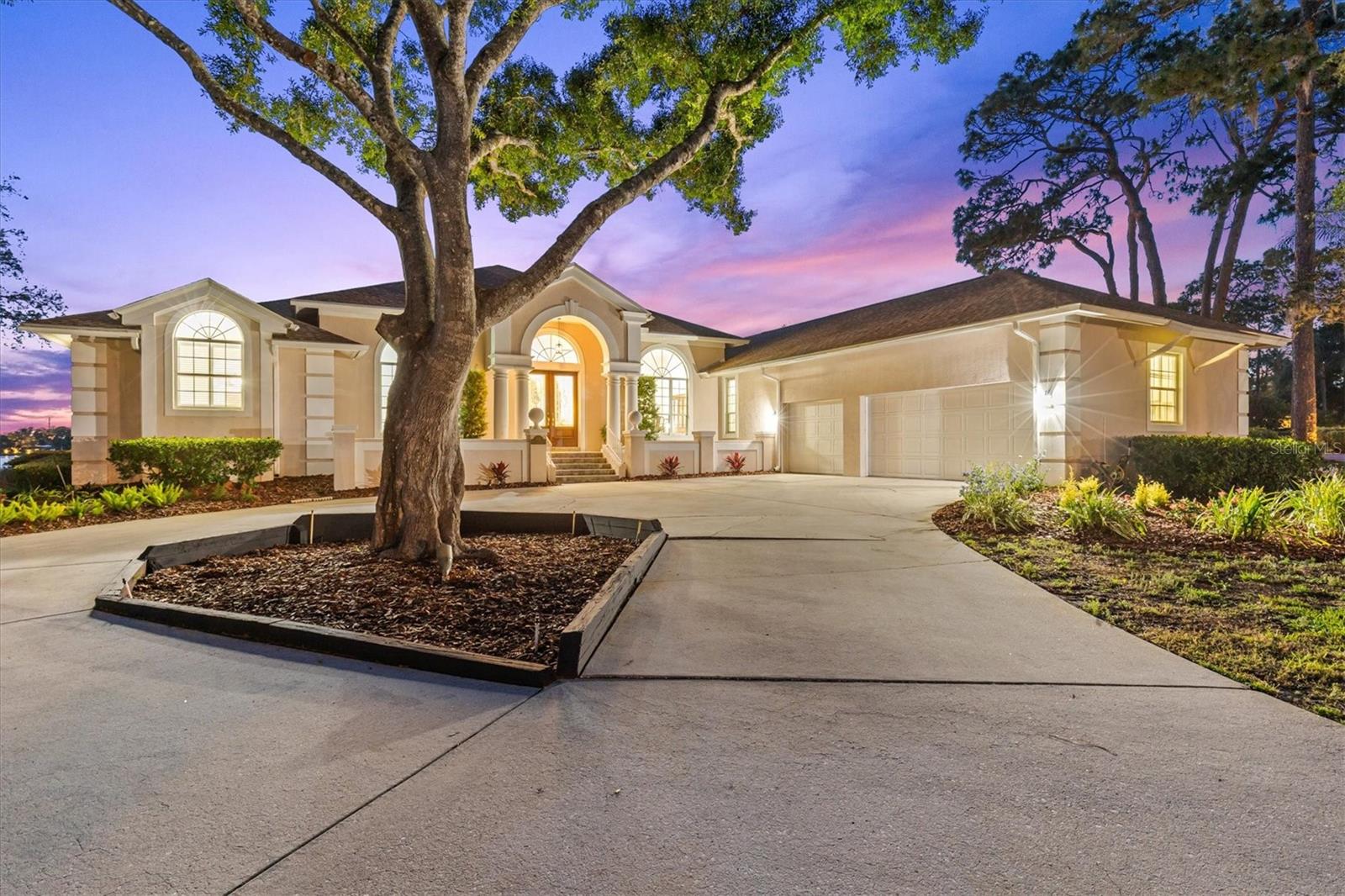 Discover a rare waterfront gem with direct Gulf access — now at a dramatically improved price of $1,649,400!

This timeless 4-bedroom, 3.5-bath home with a dedicated office, 4,579 sf, and oversized 3-car garage sits on an estate-sized lot along tranquil waters at 948 Riverside Ridge Rd. Tucked away on one quiet, tree-lined street of custom-built homes with classic Old Florida charm, this residence offers the perfect blend of privacy, serenity, and effortless coastal living.

Step inside to a bright, open floor plan filled with natural light and breathtaking panoramic water views from nearly every room. New flooring complements the updated kitchen featuring quartz countertops, neutral color cabinets, and stainless steel appliances — ideal for entertaining or quiet evenings watching the sun slowly set over the water. A versatile flex room easily serves as a home office, gym, or creative studio, while expansive windows blur the line between indoor comfort and outdoor tranquility.

Outside, your private backyard sanctuary awaits with refreshed landscaping, lush tropical plantings, and golden sunset views. Enjoy the brand-new private covered boat dock for spontaneous Gulf adventures, fishing trips, or sunset cruises. A brand-new roof in 2025, Wind Mitigation Inspection, quality construction, and a Generac home generator all provide peace of mind. Best of all, this home has never flooded — even through the area’s two most recent storms — delivering unmatched reliability and security.

Boating enthusiasts and sunset lovers will cherish the direct, protected water access to the Gulf of Mexico, nearby beaches, the historic sponge docks, charming boutiques, and fine dining. This is more than a home — it’s a coveted lifestyle of light, water, and relaxation in one of Tarpon Springs’ most desirable private waterfront neighborhoods.

Priced with immediate buyer savings in mind after a substantial price improvement — this exceptional waterfront opportunity won’t last long. Schedule your showing today and make this waterfront dream yours!