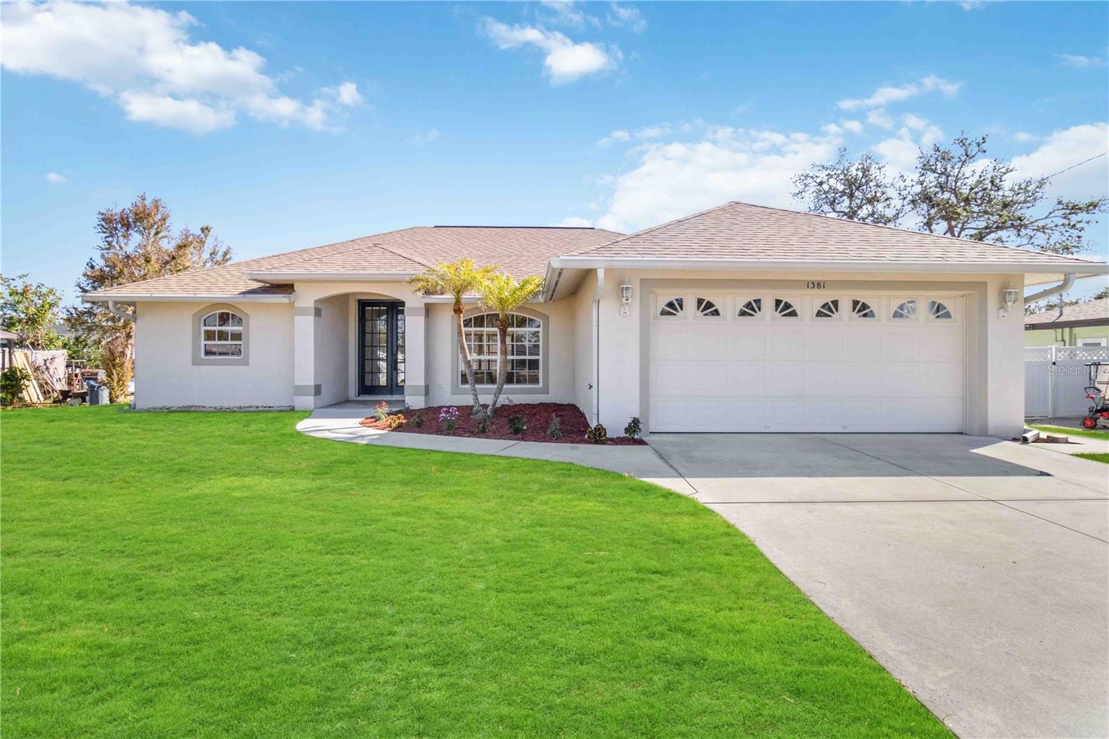 **Massive $45k price drop!!** Welcome home to 1381 Nantucket Rd, Venice, FL! This charming 2-bedroom, 2-bathroom single-family home offers 1,634 sq ft of comfortable living space on an 8,000 sq ft lot. Built in 2003, this well-maintained property features a spacious open floor plan, perfect for both relaxing and entertaining. Step inside to find a bright and airy living area with large windows that let in plenty of natural light. The modern kitchen boasts ample counter space, sleek cabinetry, and a convenient breakfast bar. The master suite includes a generous walk-in closet and an en-suite bathroom with dual sinks and a walk-in shower.  This home has been recently updated with a BRAND NEW ROOF, FRESH PAINT THROUGHOUT, and NEW CARPET, ensuring a move-in ready experience for the new owners. Enjoy Florida's beautiful weather in your private backyard, complete with a covered patio ideal for outdoor dining and lounging. The attached garage provides secure parking and additional storage space. Located in a quiet and very friendly neighborhood, this home is just minutes away from local schools, shopping, dining, and the stunning Gulf Coast beaches. Don't miss the opportunity to make this lovely house your new home!