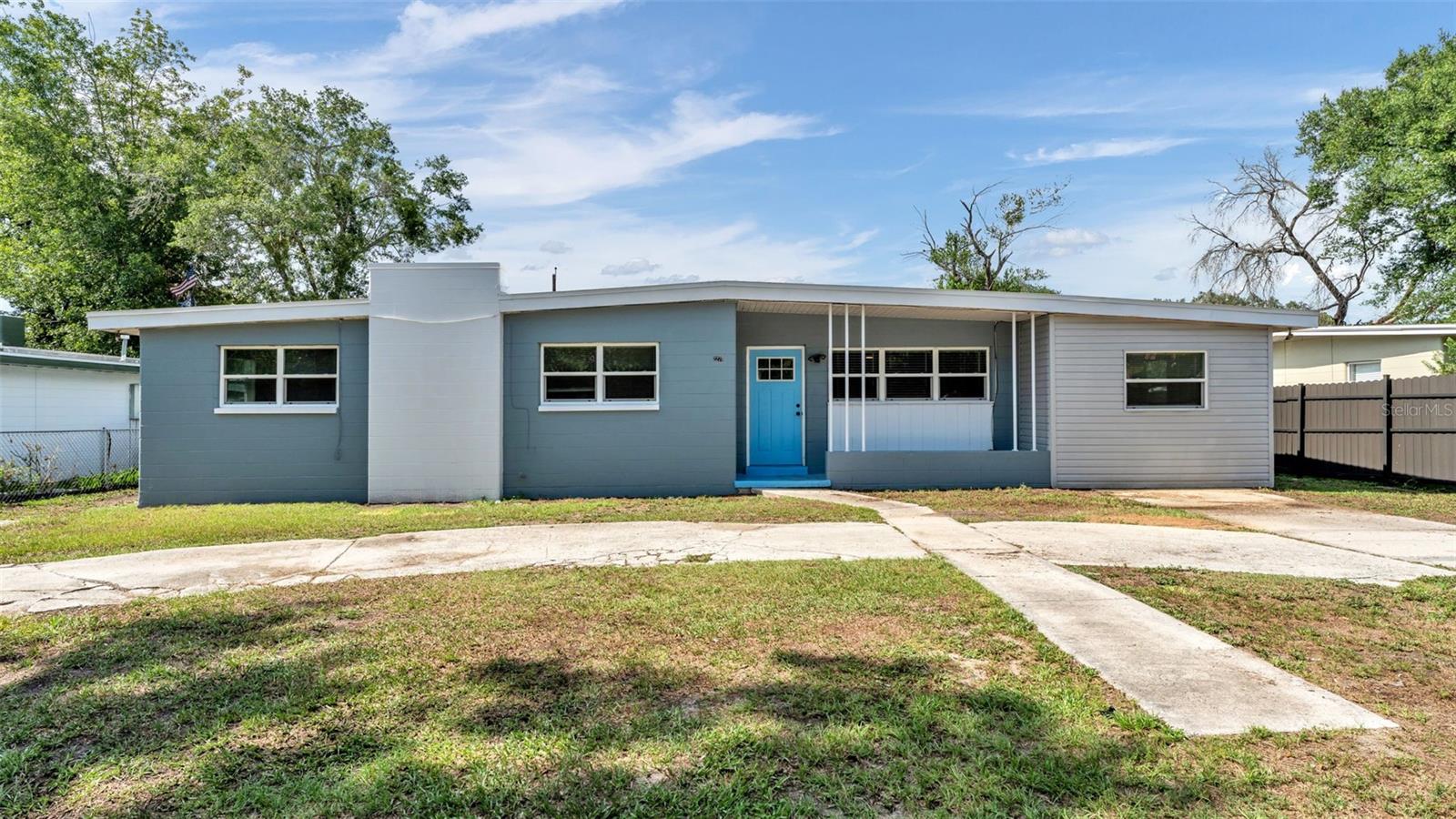 Welcome to this beautifully updated 4-bedroom, 2-bathroom home in Lakeland's Crystal Shores neighborhood! Offering 1,638 square feet of living space on a spacious .23-acre lot, this move-in ready property combines modern updates with plenty of room to live, work, and entertain.
Step inside to discover an open and inviting floor plan featuring luxury vinyl flooring, neutral finishes, and a fully renovated kitchen with shaker cabinetry, quartz countertops, stainless steel appliances, and a breakfast bar that opens seamlessly to the living area. The spacious living room provides the perfect gathering space, while the split-bedroom layout offers privacy and flexibility for families, guests, or a home office.
Outside, you'll find a large fenced backyard with ample room for pets, gardening, recreation, or future improvements. Enjoy Florida living year-round from the screened rear porch, and take advantage of the detached covered structure that offers endless possibilities for storage, a workshop, outdoor entertaining, or hobby space. Additional features include a circular driveway, central air conditioning, public utilities, and no HOA. Many updates in the last few years including hot water heater in 2017, drain field in 2018, A/C in 2021, and Roof in 2022. 
Conveniently located near shopping, dining, schools, major roadways, and downtown Lakeland, this home delivers exceptional value for homeowners and investors alike. Schedule your private showing today!
