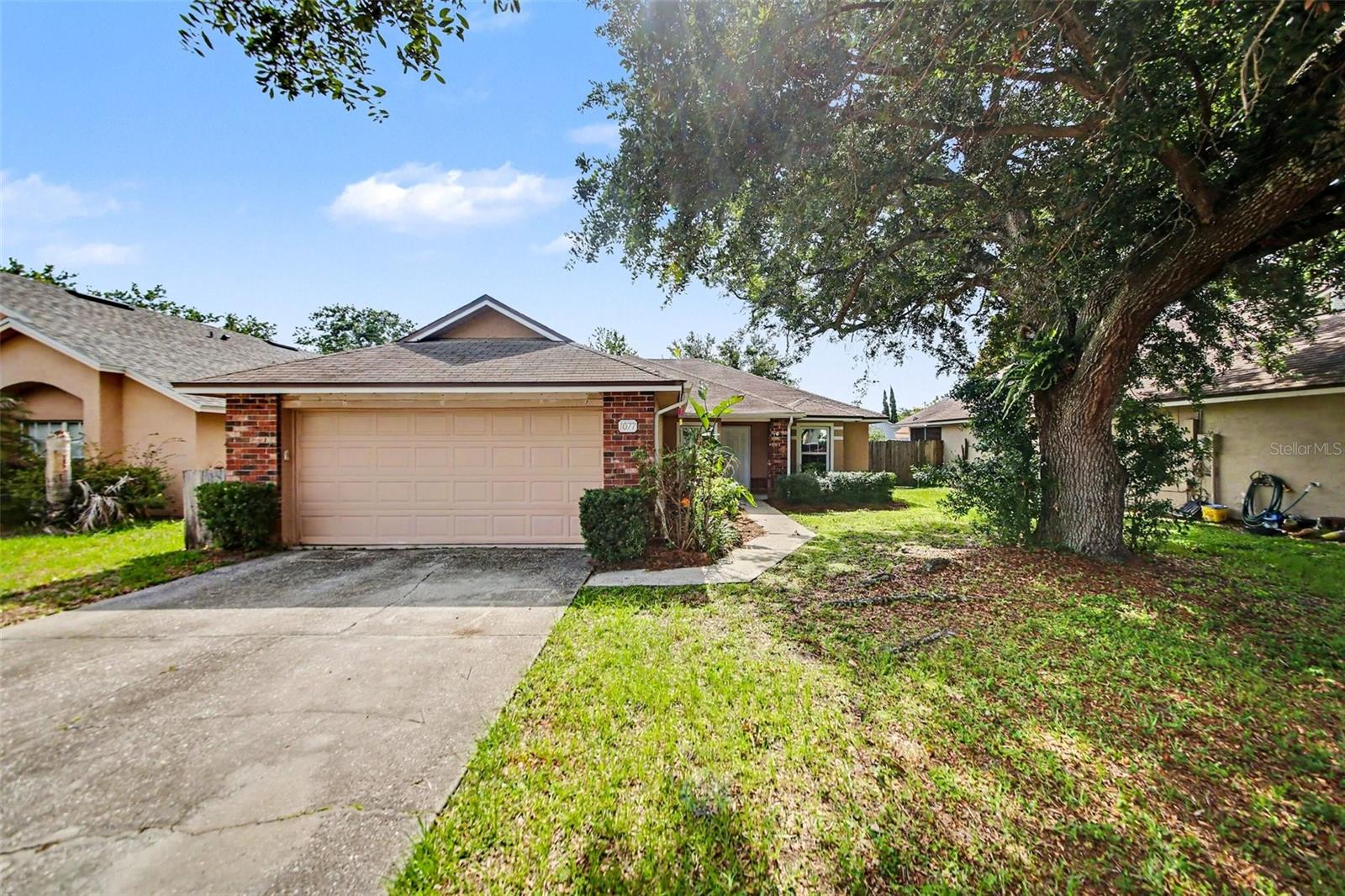 This beautiful 3-bedroom, 2-bathroom single-story home offers a wonderfully functional layout packed with exceptional everyday utility and the ultimate convenience of stairs-free living. The heart of the home features a practical, low-maintenance kitchen equipped with durable Formica countertops designed for stress-free meal preparation and effortless daily cleanup. The living space transitions beautifully to quiet personal retreats where all the bedrooms feature cozy, plush carpeting underfoot for ultimate warmth, quiet, and comfort. The interior flows seamlessly outdoors to a spacious backyard, creating a fantastic private canvas that is ready for gardening, pets, play, or relaxing weekend barbecues. Complete with an attached 2-car garage providing secure parking and extensive extra utility storage, this home is thoughtfully optimized for a comfortable and low-stress lifestyle.