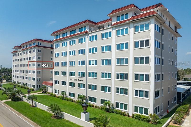 Welcome to a rare opportunity to own a 4th-floor, 2-bedroom, 2-bath sunny corner residence with unobstructed, direct GULF-FRONT VIEWS in one of the most desirable Gulf of Mexico communities on the north end of Venice Island. This pristine, fully renovated and inspected condo and building offers sweeping water views, abundant natural light, and a true beachfront lifestyle.

Positioned at treetop level, this end unit enjoys windows on multiple sides, capturing sunlight and serene views from both the front and back of the residence. The custom, renovated walk-through kitchen features soft-close wood cabinetry, granite countertops, and a generous pantry—ideal for both everyday living and entertaining. The open dining and living areas frame spectacular Gulf sunsets.

A bright and versatile sunroom with sliding glass doors, dual windows, and large custom storage provides flexible space for a home office, den, or guest accommodations. Both the living room and owner’s suite showcase breathtaking sunset views. The owner’s suite includes a walk-in closet and a renovated en-suite bath with glass shower doors, granite counters, and elegant tilework. The guest bedroom offers privacy with an adjacent walk-in closet and a fully renovated guest bath.

Additional features include high-impact windows and sliders, new AC (2023), replaced building electrical system, premium covered carport parking, elevator access steps from the unit, laundry across the hall, exterior storage on each floor, bike racks, car wash area, ample guest parking, and one of the lowest condo fees on Venice Island, professionally maintained building and landscaping.

Gulf Twin Towers owns over an acre of gated Gulf-front, beach-front property, unique to Gulf Twin Towers, with 170+ feet of private beachfront, a heated pool, lounge seating, and tropical landscaping.

Just two blocks from the Venice Public Beach Pavilion and walkable to the South Jetty, downtown Venice dining, shopping, theater, pickleball, tennis, and boating access, including Freedom Boat Club.