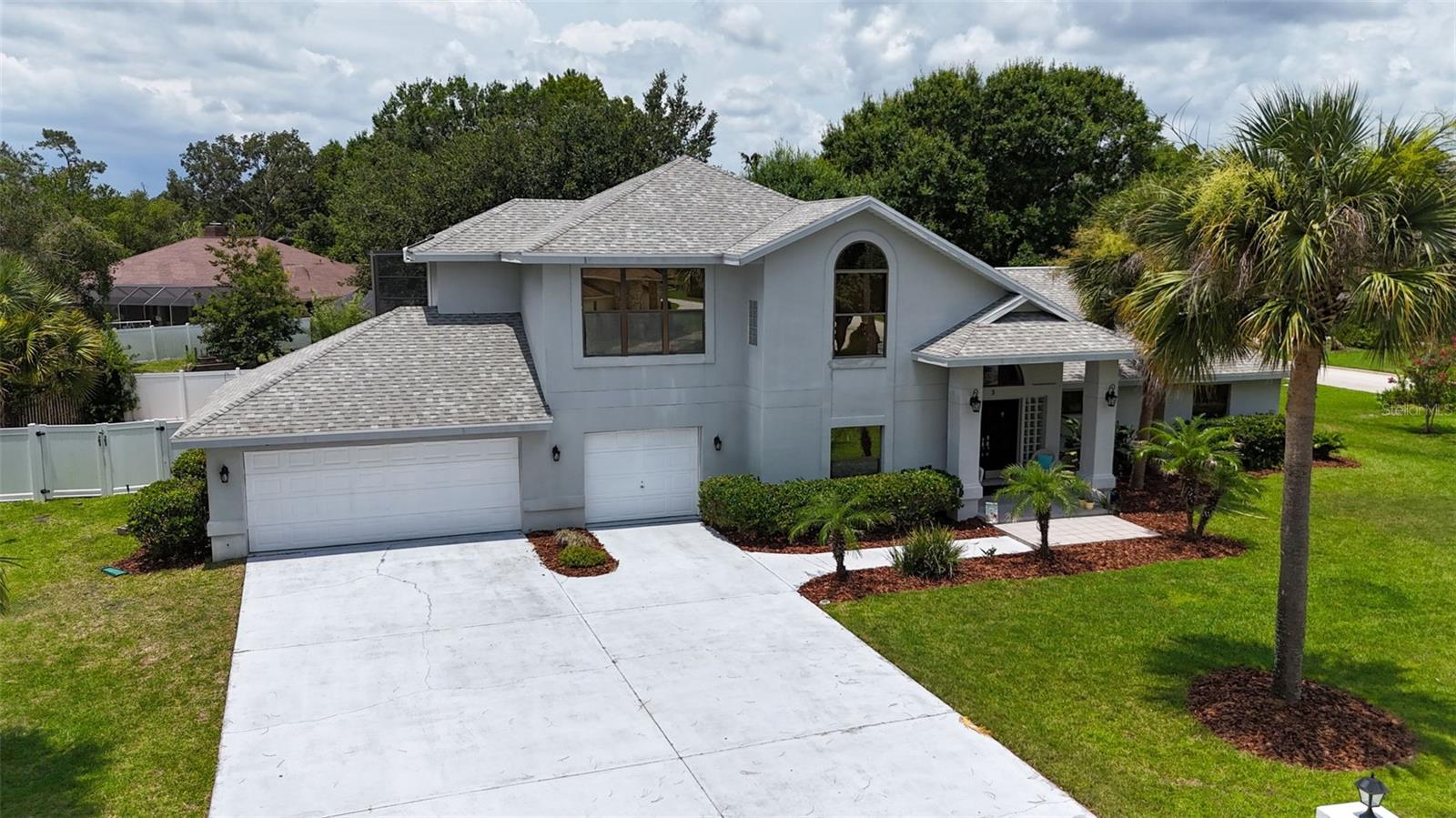 Welcome to 3 Echo Woods Way in the Breakaway Trails community of Ormond Beach—a stunning 4 bedroom/ 2.5 bath/ 3 car garage pool home that perfectly blends luxury, comfort, and Florida living.

From the moment you step inside, you'll be greeted by soaring high ceilings and an abundance of natural light that create a bright, open atmosphere. The spacious living areas flow seamlessly into the outdoor oasis through expansive sliding glass doors, offering beautiful views of the sparkling pool and private backyard.

The kitchen is designed for both everyday living and entertaining, featuring granite countertops, ample cabinetry, and plenty of workspace. Outside, enjoy your fully fenced backyard complete with a putting green, making it the perfect place to relax, entertain guests, or practice your short game year-round.

The oversized primary suite is a true retreat, boasting a private balcony overlooking the pool, a walk-in closet, and a luxurious en-suite bathroom with dual vanities, a walk-in shower, and a tub.

An additional highlight is a spacious three-car garage.

Residents of Breakaway Trails enjoy exceptional amenities including a 24-hour guarded gate, community pool, tennis courts, playground, and clubhouse. Best of all, you're just 20 minutes from the beach, with easy access to shopping, dining, and everything Ormond Beach has to offer.

Don't miss this incredible opportunity to own a beautiful home in one of Ormond Beach's premier gated communities!