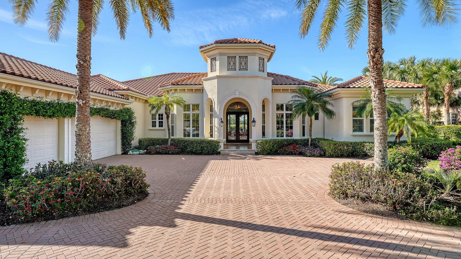 Timeless elegance meets modern luxury in this stunning 4-bedroom, 4.5-bath CERTIFIED FLORIDA GREEN custom home, situated on a private, fenced lot of over half an acre in the prestigious “Estates” section of Sarasota’s finest, The Founders Club. The Founders Club is an award-winning private member-owned golf club community offering 24 hour guarded gate access, just 262 homes nestled along 700 acres of lakes, fairways, and nature preserves. Originally a London Bay showcase model, the owners have transformed the residence into a stunning serene, spa-inspired retreat with one of Sarasota’s top designers, Angela Rodriguez Interiors. Upon entering the grand iron glass double doors, you are immediately captivated by the magnificent setting of the property and its breathtaking views looking out to the pool, pond, preserve and the club’s famous Robert Trent Jones Jr golf course. A dramatic courtyard entry, enhanced by refreshed landscaping and ambient lighting, leads you in through the intricate architectural elements including coffered ceilings, elegant crown moldings, 8-inch baseboards, Phillip Jeffries wall coverings, Serena and Lily décor accents, and chiseled travertine flooring that extends seamlessly to the outdoor living areas through 10-foot disappearing corner sliders. A chef’s kitchen, complete with Cambria quartz countertops, a Calacatta Gold backsplash, cabinet-front Monogram appliances, remote-controlled shades, and a built-in banquette with a custom-crafted wood table (that does convey with the home) flows effortlessly into the great family room. A dedicated dining room and versatile bonus/billiard room add character and function, while the private office supports today’s lifestyle needs. The serene owner’s suite occupies its own private wing.  This luxurious space includes a cozy sitting area, expansive walk-in closet, freestanding soaking tub, oversized rain shower, double quartz vanity with makeup station, and refined designer finishes.  Outdoors enjoy a true resort-style sanctuary with two covered lanais, an open-air pool, a raised spa with fountains, and a fully equipped outdoor kitchen.  Retractable awnings extend shade over the veranda for relaxed dining and entertaining. Throughout the home, fresh paint, statement walls, tongue-and-groove ceilings, and mercury glass details add texture and polish. Additional features include 3 new HVAC systems installed this year, motorized blinds and plantation shutters throughout, hurricane impact windows and sliders, an oversized 3-car motor court garage with temp-controlled storage space.  Every inch of this home has been thoughtfully designed to impress not only beauty but peace of mind and energy efficiency, as this home offers a suite of smart and energy-efficient upgrades: a new whole-house gas water heater, Control4 smart lighting and sound, a Halo water purification system, a full-house Generac generator, hurricane impact windows and sliders helping earn its status as a Florida Green Certified Home issued by the Florida Green Building Coalition.  Residents of The Founders Club enjoy access to tennis courts, a sports court, playground, and community center.  This extraordinary residence exudes refined sophistication, all within a short drive to Sarasota International Airport, shopping, dining and Sarasota’s rich art’s culture such as the Ringling Museum, Marie Selby Gardens, Van Wezel Performing Art Hall, Sarasota Orchestra, Asolo Theater.
