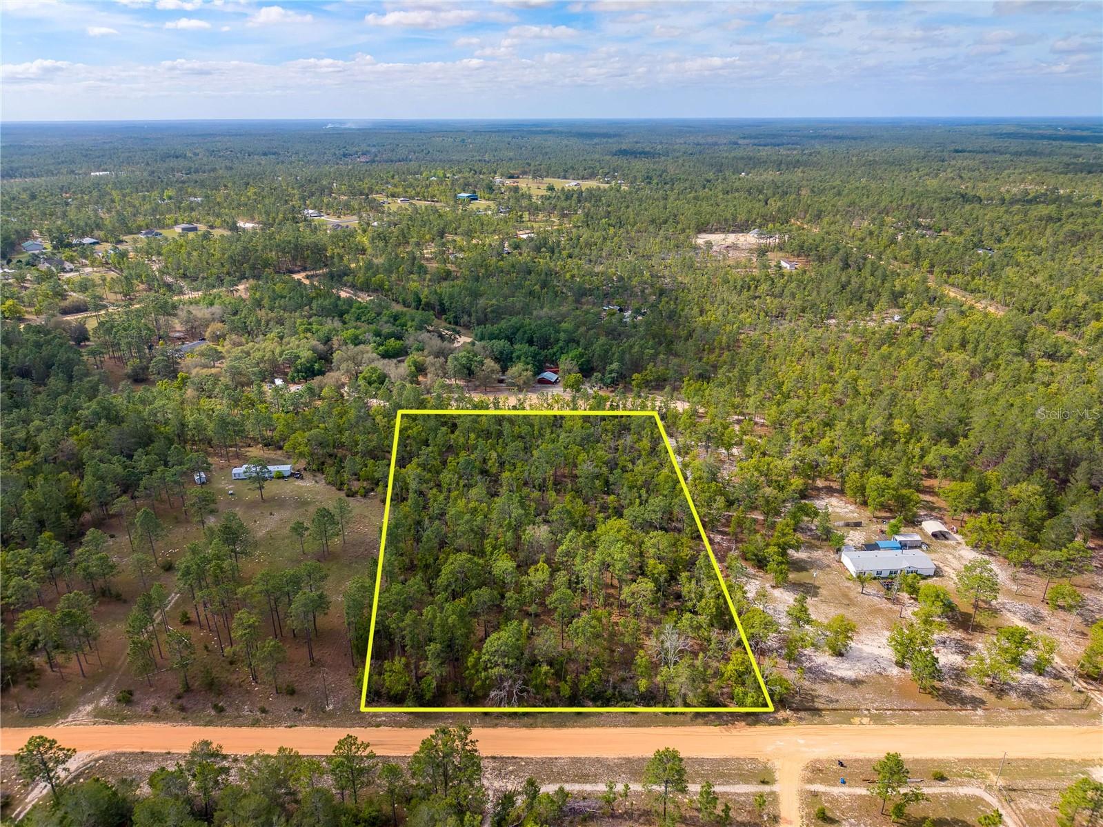 Escape the noise and reclaim your independence on this beautiful 5-acre parcel located at 230 Melrose Landing Drive in Hawthorne, Florida. This property offers the perfect blend of rural peace and modern accessibility, providing a high-and-dry canvas for your dream lifestyle.
One of the most significant advantages of this land is the prime infrastructure already in place. Featuring 330 feet of direct road frontage, the property provides easy, paved-to-grade access for your vehicles, trailers, or construction equipment. We’ve also taken the guesswork out of development, as electricity poles are already located nearby, which significantly reduces your startup costs and simplifies the building process.
Because the land is classified as Agricultural, you have the ultimate freedom to design a life on your own terms. Whether you envision a custom modern farmhouse, a place to raise livestock, or a sustainable family garden, this zoning provides the flexibility you need. Furthermore, this is premium Florida ground—level, firm, and usable. Being high and dry means you won't have to navigate the complexities of wetlands, ensuring a solid foundation for your future home or homestead.
The location puts you in the heart of North Central Florida, perfectly positioned to enjoy the quiet life without sacrificing convenience. You are only 25 minutes from Gainesville, home to the University of Florida and premier medical care. Outdoor enthusiasts will love being minutes from Lake Santa Fe for world-class boating and the Gainesville-Hawthorne State Trail for miles of exploration. Additionally, a smooth drive south puts you in Orlando, while both the Atlantic and Gulf coasts are within easy reach for weekend getaways.
In a fast-growing state like Florida, 5-acre tracts with significant road frontage and nearby power are a rare find. There is no HOA to answer to and no city congestion to fight—just 5 acres of pure Florida potential. Secure your legacy and own a tangible piece of the earth that offers both privacy and proximity. Contact us today to make 230 Melrose Landing Drive yours.

**** MOTIVATED SELLER MAKE AN OFFER ****