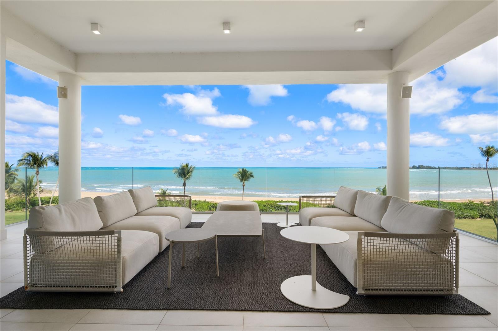 Experience unparalleled luxury and tranquility in this beachfront property located at Ocean Drive within the prestigious St. Regis Beach Resort. This exquisite residence combines modern sophistication with breathtaking coastal views, offering direct access to one of Puerto Rico’s most pristine beaches. The open-concept layout is designed to maximize natural light and ocean vistas, with floor-to-ceiling windows and elegant finishes throughout.

The spacious interior features top-of-the-line amenities and carefully curated details that exude elegance and comfort. The gourmet kitchen, equipped with premium appliances and sleek cabinetry, is perfect for entertaining. The living and dining areas open seamlessly to an expansive terrace, where you can enjoy the soothing sound of waves and spectacular sunsets over the Atlantic Ocean. Each bedroom is a luxurious retreat, complete with en-suite bathrooms and private access to the outdoor spaces. The primary suite includes a spacious walk-in closet, a soaking tub, and a rain shower, providing the ultimate retreat after a long day.

As part of the St. Regis Beach Resort, this property offers an unparalleled lifestyle with access to world-class amenities, including infinity pools, a state-of-the-art fitness center, a rejuvenating spa, and gourmet dining options. Whether you are seeking a serene escape or a vibrant social environment, this residence delivers the best of both worlds. Just a short drive from the lush El Yunque National Forest and the vibrant city of San Juan, this property is your gateway to the ultimate Caribbean dream.