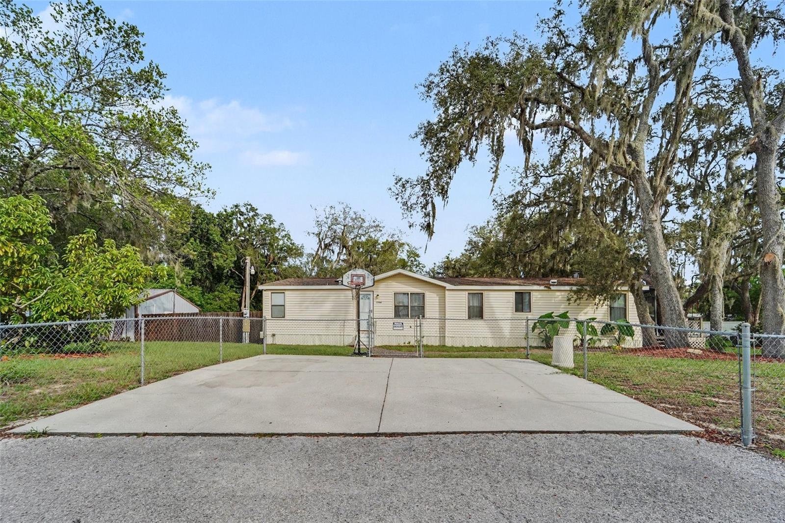 Endless possibilities await on this over half-acre, no-HOA property! The main home offers 3 bedrooms and 2 bathrooms, while the detached guest house provides incredible flexibility as a mother-in-law suite, private guest quarters, home office, or income-producing rental to help maximize your investment. The spacious lot offers plenty of room for boats, RVs, trailers, and all your toys, with space to create the outdoor oasis of your dreams. Conveniently located near shopping, dining, schools, parks, and the Gulf Coast, this property combines country-style living with everyday convenience. Whether you're looking for a multi-generational home, extra rental income, or room to grow, this rare opportunity has it all!