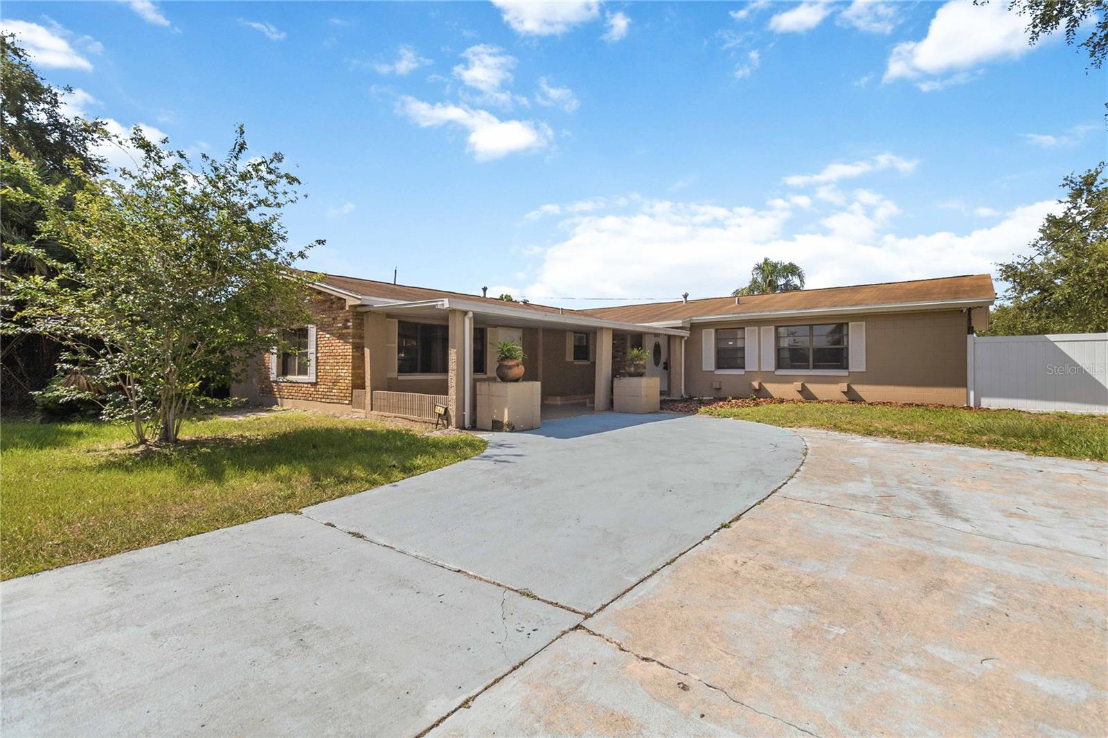 Welcome to this spacious Mid-Century Modern pool home tucked away in the quiet and established Sky Lake community of Orlando. Offering 5 bedrooms and 3 full bathrooms, this versatile residence is ideal for multi-generational living, featuring a flexible layout with a private-entrance mother-in-law suite, creating autonomy and comfort for extended family or guests.
Designed for both everyday living and entertaining, the home features a large family room filled with natural light, an updated kitchen with granite countertops and a new gas range, and seamless access to the outdoor living spaces. Step outside to enjoy the oversized private backyard with a sparkling pool — the perfect setting for weekend gatherings, peaceful mornings, or relaxing evenings under the Florida sky.
Additional highlights include a BRAND-NEW ROOF scheduled for completion in June 2026 and the opportunity to personalize and make this well-loved home your own. Property is being sold as-is.
Located in the heart of Sky Lake, residents enjoy the convenience of nearby shopping, dining, public transportation, hospitals, and major roadways, all while being just minutes from Universal Orlando Resort, The Mall at Millenia, Orlando International Airport, and downtown Orlando. The area offers an ideal blend of accessibility, established neighborhood charm, and the vibrant Central Florida lifestyle so many buyers seek.