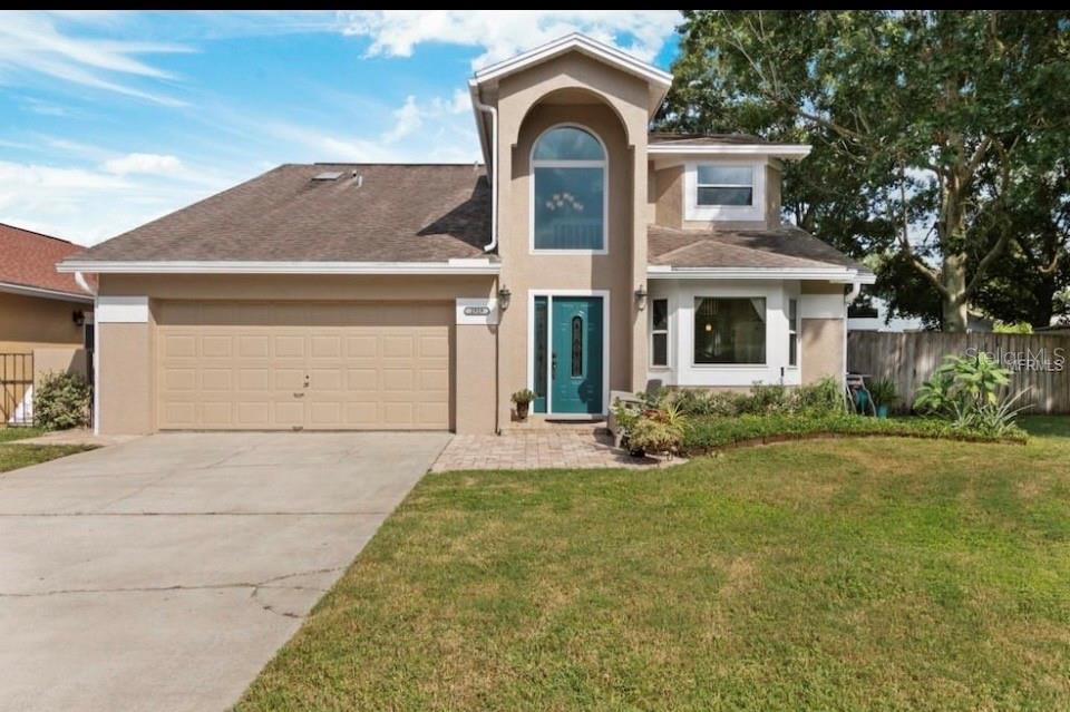 Location, location, location. Located in the desirable Metro West  Pembrooke community this two story , 3 bedroom 2.5 bathroom home features 1917 sq. ft. living space and is located in a quiet cul-de-sac. Enter the foyer and you are greeted with hardwood flooring and an updated kitchen. Martha Stewart wood cabinets , granite counter tops, plenty of cabinet space and even a built in  wine rack. Entertain in a large family/dining room combo with high vaulted ceilings. The sliding glass door will lead to you out to the large fenced in backyard that has plenty of space for cooking and outdoor fun. Enjoy the luxury of having the master bedroom on the first floor with an ensuite bathroom. 
Upstairs you have two bedrooms and a nice updated bathroom. The loft is large and is great for an office or a guest area.  Enjoy the community pool, tennis court and dog park just around the corner. The HOA is low. Conveniently located near shops, Millenia Mall, Universal Studios, great restaurants, Valencia Community College, 408 and I-4.  This home will not last long! Schedule your showing today.
