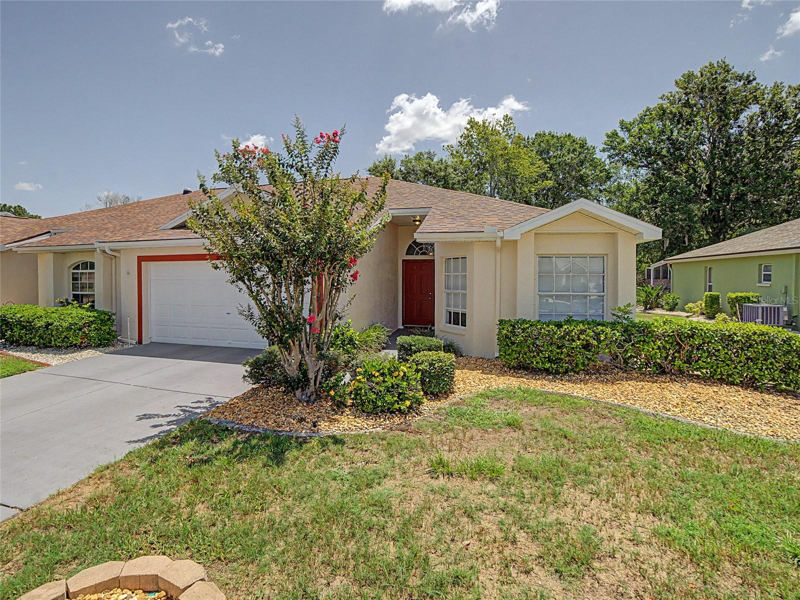 Virtually Staged. Experience the perfect blend of comfort, convenience, and carefree living in this beautifully maintained Camelia floor plan villa-style single-family home, nestled within the highly desirable Magnolia Lakes neighborhood of Sun City Center—one of America's premier active adult communities.

Designed with an inviting split-bedroom floor plan, this 2-bedroom, 2-bath residence showcases soaring vaulted ceilings, abundant natural light, and peaceful conservation views with no rear neighbors, creating a private and tranquil retreat. Newer wide-plank blonde laminate flooring flows seamlessly throughout the home, complementing the bright, open living and dining spaces ideal for both everyday living and entertaining.

The cheerful kitchen offers laminate cabinetry and countertops, a closet pantry, updated kitchen faucet (2026), double bowl kitchen sink 2026, garbage disposal (2026), dishwasher (2026), and a charming breakfast nook overlooking the serene conservation area—an ideal place to enjoy your morning coffee while taking in Florida's natural beauty. The kitchen and baths remain exceptionally well maintained, providing the perfect opportunity to personalize with your own style over time.

The spacious owner's suite features a walk-in closet and private en-suite bath complete with a walk-in shower, while the guest bedroom and bath are thoughtfully positioned on the opposite side of the home for maximum privacy.

Major improvements provide outstanding peace of mind, including:

New Roof (2024)
HVAC (2026)
Whole-home Repipe (2026)
Hot Water Heater (2026)
Interior & Exterior Paint (2026)
Dishwasher (2026)
Garage Door Opener (2026)
Kitchen Faucet (2026)
Garbage Disposal (2026)

Additional highlights include an inside laundry room with abundant storage, a spacious 2-car garage, and a bright Florida Room that opens onto a freshly painted patio, perfect for grilling, entertaining, or simply relaxing in the Florida sunshine. Even better, the lawn's irrigation is supplied from the community pond, helping reduce monthly utility costs. Magnolia Lakes HOA offers exceptional value by providing lawn maintenance, water, and irrigation for just $370 per quarter, allowing for truly low-maintenance living.

Living in Sun City Center means embracing an award-winning lifestyle. Named the #1 Retirement Community in America by REALTOR websites, this renowned golf-cart community offers an incredible array of amenities including indoor and outdoor pools, spas, fitness center, pickleball, tennis, lawn bowling, arts and crafts studios, woodworking, theater, library, clubs, social activities, volunteer opportunities, and countless ways to stay active and connected. Golf enthusiasts will appreciate nearby Caloosa Golf & Country Club and Cypress Creek Golf Club.

Perfectly situated between Tampa, Sarasota, and St. Petersburg, you'll enjoy convenient access to three international airports, world-famous Gulf Coast beaches, championship sports, premier shopping, exceptional dining, theaters, museums, Disney, specialty medical facilities, and endless entertainment.

Offering an outstanding combination of major system updates, serene conservation views, low-maintenance living, and the unparalleled Sun City Center lifestyle, this move-in-ready home presents an exceptional opportunity to enjoy Florida living at its finest. Schedule your private showing today—this exceptional home won't last long.