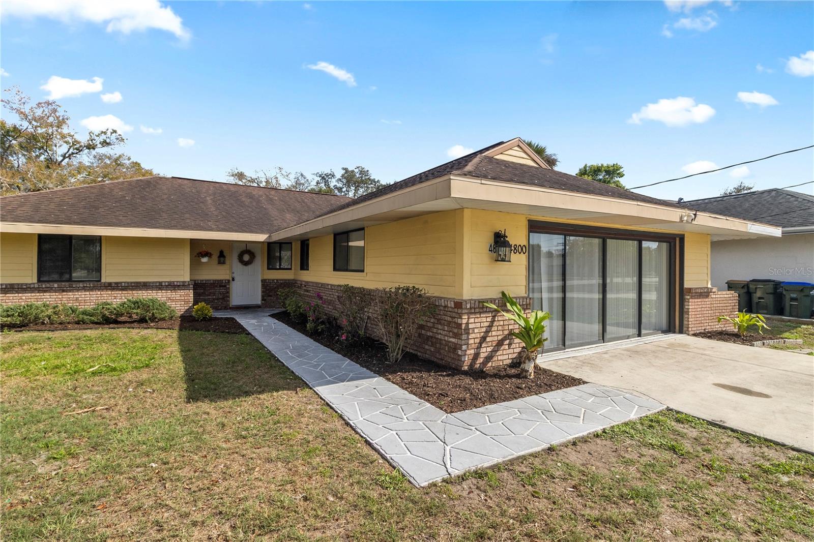 Significant price improvement! Owner is ready to sell! Are you ready for weekend floats in the pool? The grill is fired up. The kids are splashing about, laughing, and actively entertained all summer. This home offers a lifestyle upgrade right in the heart of North Port. Here you have the perfect blend of comfort, flexibility, and privacy — all on CITY WATER. For those of us that have battled the stinky well water, we know how much value this upgrade adds.  Step inside to a spacious layout designed for both everyday living and entertaining. The oversized kitchen is the true centerpiece of the home, featuring abundant counter space and a large breakfast bar that easily becomes the gathering spot for morning coffee, homework sessions, or an evening toast with friends. The open flow into the main living areas keeps everyone connected.  Retire at night to your bedroom split from the others and Calgon your cares away in a relaxing bubble bath.  The garage has been purposefully converted, and includes a dedicated office space complete with its own private exterior entrance — ideal for a home business, remote work setup, studio, therapy space, or even a private guest retreat. The separate entry creates flexibility while maintaining the privacy of the main home. All in the comforts of air conditioning. This space adds an additional 545 sq ft to your footprint. What a great FOURTH BEDRROM. Out back, your private yard becomes your personal retreat. Enjoy sunny afternoons floating in the pool, weekend BBQs, or peaceful evenings under the stars. The backyard offers privacy and room to unwind without feeling exposed. Whether you’re working from home, hosting friends, or simply enjoying quiet Florida evenings poolside, this North Port home delivers versatility and the option for MULTI-GENERATIONAL living. Plus you are just a short drive away from dining, retail and entertainment. North Port offers a family centric community with great schools, recreational opportunities and activities for all age levels. The walls will be filled with your family pictures and your mind filled with fond memories created in this home.