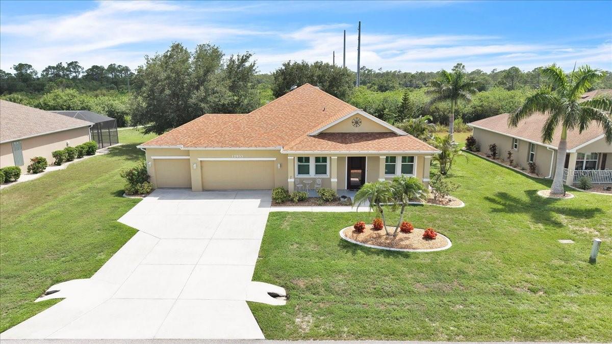 PARTIALLY FURNISHED HOME! Welcome to this beautifully maintained 4-bedroom, 2-bathroom home offering 2,170 square feet of comfortable living space in the desirable deed-restricted community of Lake Pembroke. From the moment you arrive, the inviting curb appeal stands out with a spacious 3-car garage, extended driveway, covered front porch, and tropical landscaping featuring mature palms and colorful flowering plants. Situated on a generously sized homesite, this residence enjoys a peaceful setting surrounded by scenic lakes, ponds, and natural habitat. Step inside to discover soaring volume ceilings and a spacious open floor plan designed for comfortable living and entertaining. The home features a combined living and dining area, along with a separate family room offering additional space for gatherings. The well-appointed kitchen is the heart of the home, showcasing abundant oak cabinetry, granite countertops, a stylish tile backsplash, large pantry, and oversized breakfast bar overlooking the main living area. Stainless steel appliances include a cooktop, double wall ovens, built-in microwave, and French-door refrigerator. Recessed lighting and the open design create a bright and welcoming atmosphere. The spacious primary suite offers a private retreat with an elegant tray ceiling, large walk-in closet with custom shelving, and ensuite bathroom featuring dual vanities, a garden tub, and separate walk-in shower. Three additional bedrooms provide plenty of space for family, guests, or a home office, each offering generous closets. The guest bathroom includes dual sinks and a tub/shower combination for added convenience. The functional laundry room includes a washer and dryer, additional storage space, and a dedicated area for household tasks, helping keep daily routines organized and efficient. Sliding glass doors open to a screened lanai where you can relax and enjoy peaceful pond views and beautiful Florida sunsets. The thoughtfully maintained yard features mature landscaping, decorative concrete curbing, and an irrigation system for easy upkeep. This home offers exceptional value with numerous upgrades, including a new A/C system installed in 2025, a shingle roof approximately five years old, public water and sewer, whole-house water filtration system, impact-resistant windows, storm shutters, and a hurricane-rated garage door for added peace of mind. Located outside of a flood zone, this property provides added protection and helps keep ownership costs manageable.
Lake Pembroke offers a serene residential setting with scenic surroundings while remaining conveniently located near everyday amenities. Enjoy easy access to I-75, shopping, dining, golf courses, medical facilities, banking, Charlotte Harbor, historic Punta Gorda, Gulf beaches, and the Arcadia antique district. Multiple airports, including Punta Gorda Airport and Southwest Florida International Airport, are within an easy drive, making this an ideal home for year-round living or a seasonal Florida retreat. **PLEASE ENJOY THE 3D INTERACTIVE VIRTUAL TOUR ASSOCIATED WITH THIS LISTING**