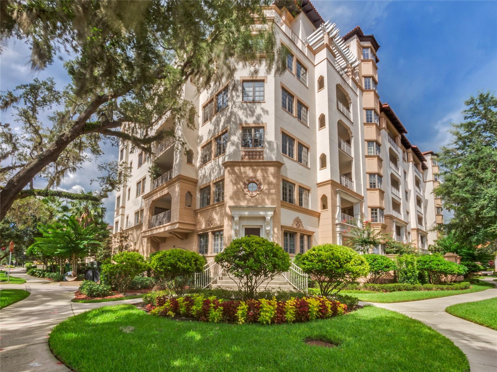 Premier downtown Winter Park condominium. It doesn’t get any better than this. Unit #601 has been artfully remodeled with top quality finishes and amenities located in The Residences. It is a 2-story penthouse covering the entire west end of the top two floors and offering the most spectacular views of any residential unit in Winter Park. To the south, you look down and across the Rollins College campus with its traditional Mediterranean roof lines and the blue waters of tree-lined Lake Virginia. To the southwest, view the unimpeded downtown Orlando skyline, dramatically lit at night with seasonal fireworks displays. To the north is The Alfond Inn hotel & Lake Osceola, and to the direct west is Park Avenue and the downtown shopping district. The unit is wrapped with large entertainment balconies and features key interior rooms. The effect is like floating in the air. The building offers 24/7 security and concierge service with staff on duty at all times. There is an awe-inspiring rooftop pool and entertaining deck area, a spacious card room, parlor, art-work lined promenade and secured underground parking. Unit #601 has its own private oversized 2-car garage within the main parking garage. Coded elevators bring you safely to your special entrance lobby and double door foyer with fabulous 2-story great room and wall of glass beyond with adjacent piano/sitting area. Additional rooms on the main floor are the dining area, magnificent chef's kitchen with top-of-the-line appliances, exquisite cabinetry & butler's pantry. Office/library, secluded bedroom suite, laundry room and powder bath. A sweeping staircase (or private elevator) takes you to the 2nd floor containing the luxurious expansive master suite with sumptuous bath, morning kitchen, and spacious walk-in closet, plus 3rd and 4th separate and private bedroom suites including one with its own lounge area. This is truly a one-of-a-kind and special opportunity to own the best of the best in lock-n-leave in downtown Winter Park.