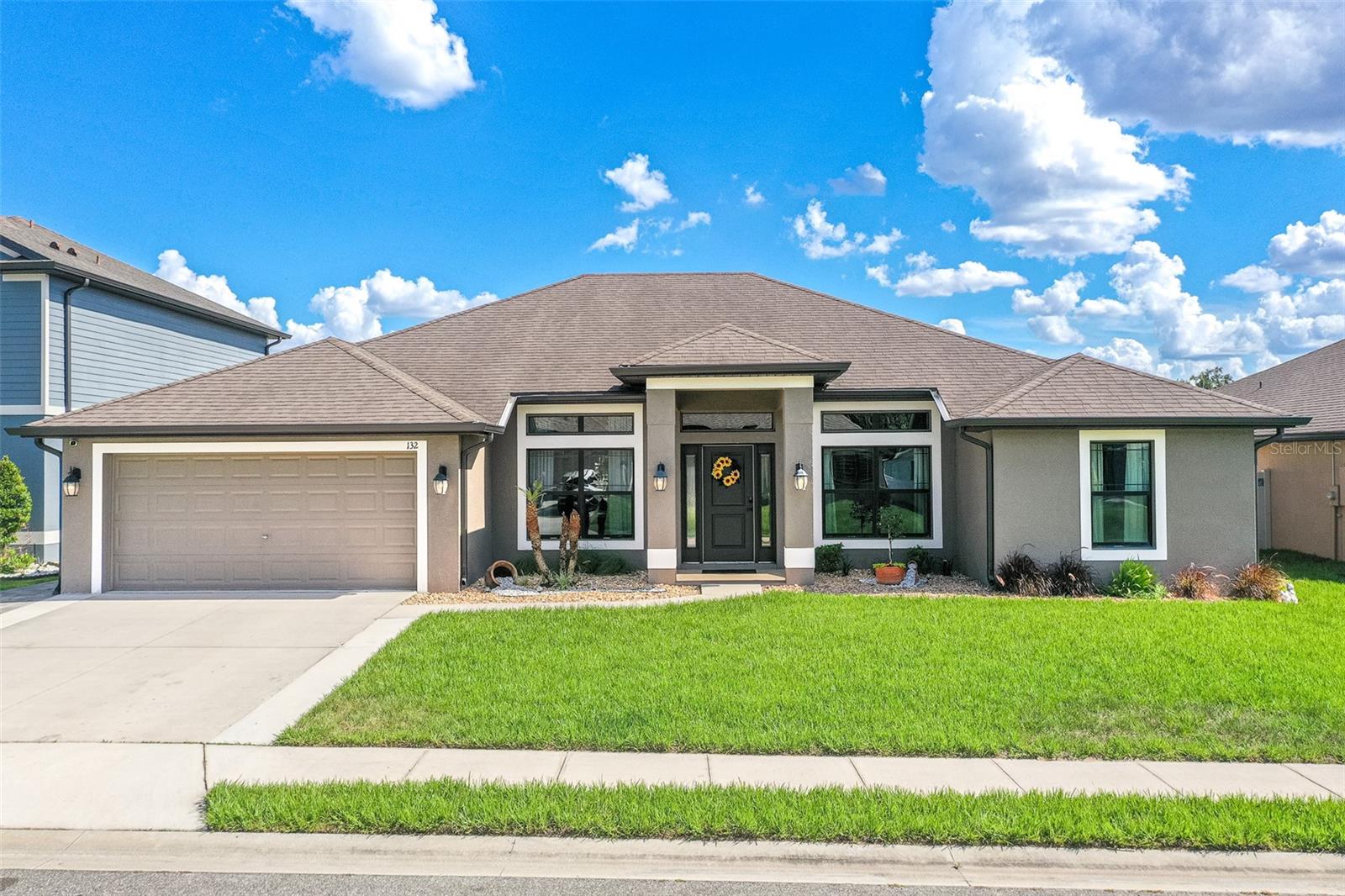 Prepare to be impressed by this exceptional modern farmhouse located in the highly sought-after boutique community of Heritage Park in Mulberry. This beautifully maintained 4-bedroom, 2-bathroom home offers the perfect combination of modern comfort, functional design, and energy efficiency in a peaceful community of only 46 homes with low HOA fees and no CDD taxes. 

Inside, you’ll find a spacious open-concept floor plan filled with natural light, soaring vaulted ceilings, elegant tile flooring throughout, and a formal dining room ideal for entertaining. The gourmet kitchen is designed to impress with a massive center island, abundant cabinetry, premium finishes, generous counter space, and a stunning CUSTOM REAL WOOD HOOD, all overlooking the expansive living area for seamless everyday living. The split-bedroom layout provides added privacy, while the spacious primary suite features a luxurious ensuite bathroom with dual vanities and ample storage. Additional interior highlights include a custom laundry room, flexible office space that can easily be converted into an additional bedroom, an in-wall pest control system, and a spacious 2-car garage.

This energy-efficient home is features FULLY OWNED SOLAR PANELS along with THREE FULLY PAID SOLAR BATTERIES, providing exceptional long-term savings and peace of mind. Step outside into your private backyard retreat featuring a covered lanai, EXPANSIVE 25x27 PAVER PATIO, two additional paver walkways, a spacious sitting area with a built-in bench, and a fully equipped outdoor kitchen island complete with water access and electricity—perfect for entertaining year-round. The backyard also showcases an impressive pergola, built-in outdoor grill, beautifully maintained landscaping, and a full irrigation system that further enhances the home’s outstanding curb appeal.

Located in the established Heritage Park community, this home offers convenient access to highly regarded Willow Oak School, nearby parks and recreational areas, the Mulberry Public Library, and charming Downtown Mulberry with its local shops, dining, and community events. Enjoy the perfect blend of neighborhood comfort and everyday convenience in one of Mulberry’s growing communities.