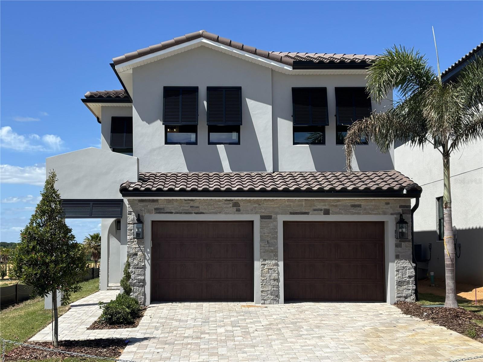 Under Construction. Set along Bella Collina’s signature 1st tee box, this luxury two-story home by Wilmington Homes offers 3,159 square feet of pristine golf course living. Designed with an open layout and seamless indoor-outdoor connection, the main living area flows through large sliding doors to a covered lanai with summer kitchen, ebony tongue-and-groove ceiling, and motorized screens. Outside, a resort-style pool with sunshelf creates a private escape for lounging and entertaining.

The gourmet kitchen features quartz countertops, Wolf and Sub-Zero appliances, and a walk-in pantry, while engineered hardwood flooring and upgraded lighting add warmth and character. The owner’s suite upstairs includes a private balcony spanning the back of the home with sweeping views of the #1 tee box and fairway. Additional features include a golf cart charging station, upgraded insulation package, and 2-car garage.

Enjoy access to Bella Collina’s award-winning amenities including the iconic Tuscan clubhouse, championship Nick Faldo–designed golf course, resort pool, fitness center, spa, tennis courts, walking trails, dining venues, and a vibrant year-round social calendar—all within one of Florida’s most picturesque settings.

Contact us today to arrange your private showing and experience the luxury, beauty, and lifestyle that only at Bella Collina. Developer will Defer the $40,000 Sports Membership Deposit.