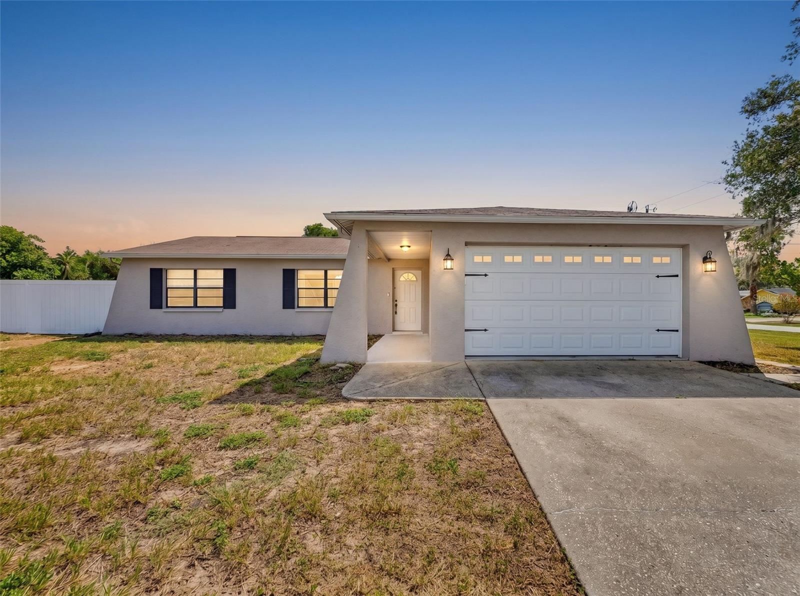 Welcome home to this beautiful three-bedroom, two-bath, two-car garage pool home situated on a desirable corner lot in the heart of Spring Hill, Florida. Designed with comfort and entertaining in mind, this home features soaring cathedral ceilings, attractive laminate flooring, an updated kitchen, and a desirable split-bedroom floor plan. The spacious primary suite offers a relaxing retreat, while the backyard is your own private oasis with an in-ground pool, in-ground spa, large screen porch, and PVC privacy-fenced yard perfect for gatherings or quiet evenings at home. Conveniently located just minutes from Commercial Way (US-19) and State Road 50 (Cortez Boulevard), you'll enjoy quick access to the Suncoast Parkway (SR 589) for an easy commute throughout the Tampa Bay area. The State Road 50 corridor offers an abundance of shopping, restaurants, entertainment, and everyday conveniences just moments from your doorstep. This is the Florida lifestyle you've been waiting for—come take a look before this exceptional home is gone!