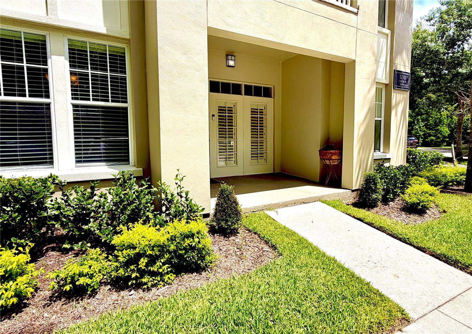 Don't miss this opportunity to own a piece of paradise in Celebration's highly sought-after Artisan Park where EVERY DAY feels like a vacation! This beautifully maintained first-floor condominium offers the perfect blend of privacy, comfort, and resort-style living.

Featuring 3 bedrooms, 2 bathrooms, and a versatile flex room with a closet that can easily serve as a home office, den, or additional bedroom, this spacious residence is filled with natural light and thoughtfully designed living spaces. Water views from the living room and master bedroom.  One of the home's most desirable features is the rare oversized attached garage, providing exceptional convenience and storage, along with an additional private storage closet located on the same floor as the unit.

Inside, you'll find an open-concept floor plan highlighted by engineered hardwood flooring, a spacious kitchen with granite countertops, abundant cabinetry, and a bright breakfast area perfect for morning coffee. The split-bedroom layout offers privacy for owners and guests alike. The primary suite features an enormous walk-in closet and a well-appointed bathroom, while a generous utility and laundry room provides excellent storage solutions.

Residents of Artisan Park enjoy exclusive access to a private clubhouse featuring a full-service restaurant and bar, state-of-the-art fitness center with locker rooms, billiards area, resort-style pool, and hot tub just steps away.

Living in Celebration means embracing a charming small-town atmosphere with a vibrant downtown filled with boutique shopping, exceptional dining, and year-round community events. Enjoy miles of walking and biking trails, multiple community pools, fitness centers, dog parks, and the incredible sense of community that makes Celebration one of Central Florida's most unique and desirable places to call home.  ALL INFORMATION IS INTENDED TO BE ACCURATE IT IS THE BUYER AND BUYERS RESPONSIBILITY TO VERIFY ALL DETAILS