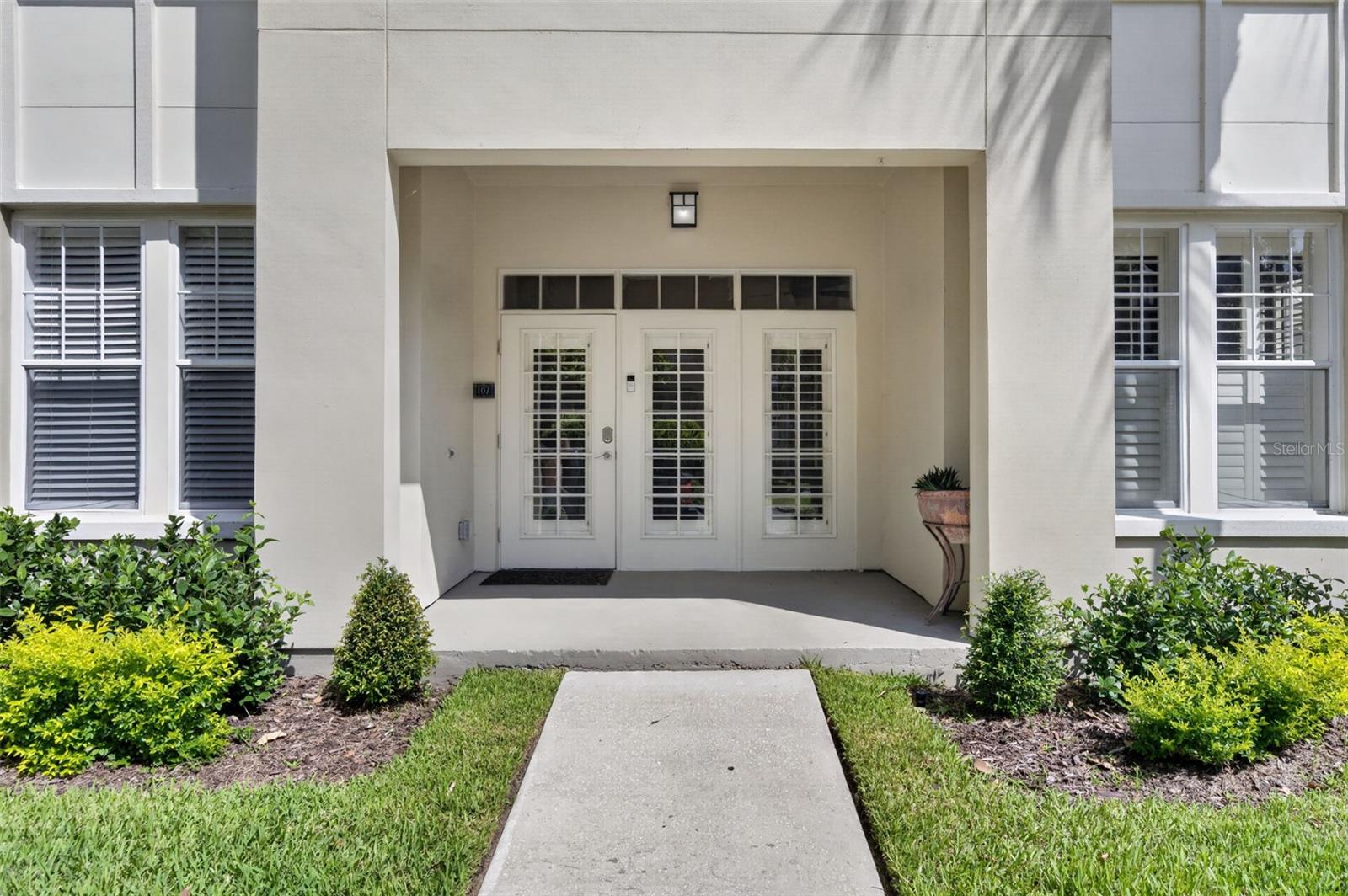 Don't miss this opportunity to own a piece of paradise in Celebration's highly sought-after Artisan Park where EVERY DAY feels like a vacation! This beautifully maintained first-floor condominium offers the perfect blend of privacy, comfort, and resort-style living.

Featuring 3 bedrooms, 2 bathrooms, and a versatile flex room with a closet that can easily serve as a home office, den, or additional bedroom, this spacious residence is filled with natural light and thoughtfully designed living spaces. Water views from the living room and master bedroom.  One of the home's most desirable features is the rare oversized attached garage.

Inside, you'll find an open-concept floor plan highlighted by engineered hardwood flooring, a spacious kitchen with granite countertops, abundant cabinetry, and a bright breakfast area perfect for morning coffee. The split-bedroom layout offers privacy for owners and guests alike. The primary suite features an enormous walk-in closet and a well-appointed bathroom, while a generous utility and laundry room provides excellent storage solutions.

Residents of Artisan Park enjoy exclusive access to a private clubhouse featuring a full-service restaurant and bar, state-of-the-art fitness center with locker rooms, billiards area, resort-style pool, and hot tub just steps away.

Living in Celebration means embracing a charming small-town atmosphere with a vibrant downtown filled with boutique shopping, exceptional dining, and year-round community events. Enjoy miles of walking and biking trails, multiple community pools, fitness centers, dog parks, and the incredible sense of community that makes Celebration one of Central Florida's most unique and desirable places to call home.  ALL INFORMATION IS INTENDED TO BE ACCURATE IT IS THE BUYER AND BUYERS RESPONSIBILITY TO VERIFY ALL DETAILS