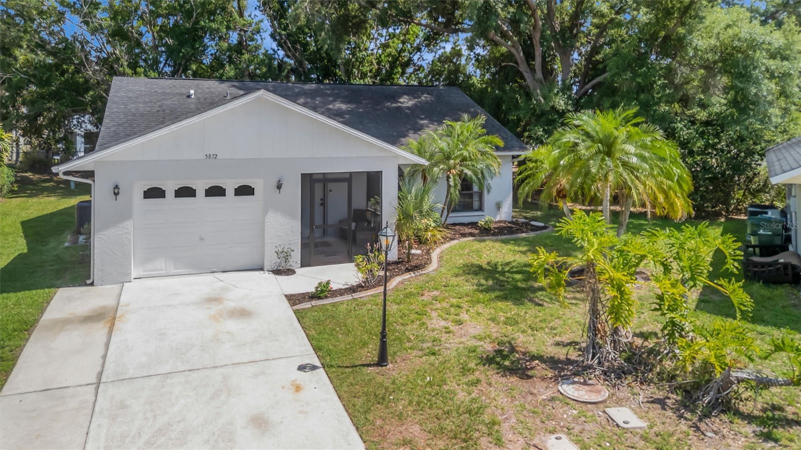 Welcome to Deer Hollow! This charming 3-bedroom, 2-bath home offers the perfect blend of comfort, convenience, and value in one of Sarasota's most centrally located communities. Featuring an open and airy floor plan with high ceilings, tile flooring throughout the main living areas, and stylish stone countertops, this home is designed for easy Florida living. The spacious living area flows seamlessly to the kitchen and dining space, while sliding glass doors bring in plenty of natural light bring you out to the large screen lanai to enjoy the peaceful back yard.

Enjoy peace of mind with solid block construction, a newer roof, and low annual HOA fees. The backyard provides room to relax, entertain, or let pets play, and the attached 1-car garage adds extra storage and convenience. Deer Hollow residents appreciate the quiet neighborhood setting with sidewalks and easy access to shopping, dining, parks, I-75, UTC Mall, downtown Sarasota, and world-famous Gulf beaches.

Whether you're a first-time homebuyer, seasonal resident, or investor, this move-in ready Sarasota home is a fantastic opportunity you won't want to miss!