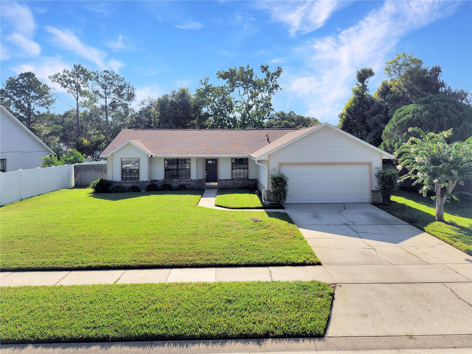Welcome home to this charming 3-bedroom, 2-bath residence ideally located in the heart of Orlando. Perfectly positioned between Orlando International Airport and Downtown Orlando, this home offers the ideal combination of comfort, convenience, and functionality.

Step inside to a bright and inviting floor plan featuring spacious living areas and a formal dining room, perfect for entertaining. The well-appointed kitchen offers ample cabinet and counter space, stainless steel appliances, and overlooks the main living area, creating an open and connected feel.

French doors lead to a versatile Florida room, providing additional space that's ideal for relaxing, working from home, or hosting guests year-round. Outside, the large fenced backyard offers plenty of room for outdoor entertaining, gardening, or future enhancements.

The spacious primary suite is conveniently located near the main living areas and features a walk-in closet, ceiling fan, and an en-suite bathroom with a walk-in shower. Two additional bedrooms and a full guest bathroom provide comfortable accommodations for family or visitors.

Additional features include a laundry area located in the garage for added convenience.

With its desirable location, functional layout, and generous indoor and outdoor living spaces, this home is a wonderful opportunity you won't want to miss. Contact our office today to schedule your showing.