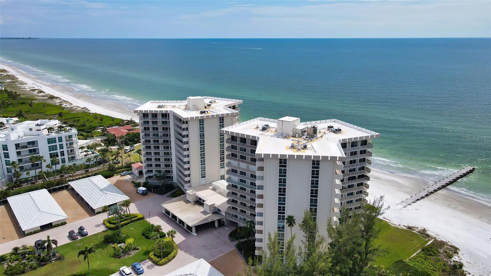 Experience the tranquility of Gulf-front living from this beautifully updated residence at the prestigious Islander Club on South Longboat Key. Ideally positioned on the highly desirable north side of the building, this exceptional beachfront condominium enjoys a uniquely private setting with expansive views, abundant natural light, and a peaceful atmosphere rarely found in condominium living.
Offering the convenience of first-floor walk-out access, the residence lives much like a private beachfront home, with direct access from the terrace to the lush grounds, beachfront pool, and the pristine white sands of the Gulf of Mexico. Floor-to-ceiling glass showcases sparkling Gulf views, breathtaking sunsets, and refreshing coastal breezes throughout the day.
Thoughtfully updated and impeccably maintained, the residence offers comfortable and elegant living spaces ready to be enjoyed immediately . The open layout seamlessly connects indoor and outdoor living, creating an ideal setting for both relaxing and entertaining.
Residents of The Islander Club enjoy an exceptional collection of amenities, including 400 feet of private beachfront, an Olympic-size beachfront pool, a newly renovated fitness and community center, Har-Tru tennis courts with planned pickleball additions, on-site management, gated entry, library, conference facilities, and a highly desirable owner-to-owner rental program.
Located just minutes from St. Armands Circle and downtown Sarasota, this residence offers convenient access to world-class dining, boutique shopping, cultural attractions, marinas, and the very best of Florida's Gulf Coast lifestyle. A rare opportunity to enjoy privacy, beachfront living, and the unmatched beauty of Longboat Key at one of the island's most sought-after addresses.