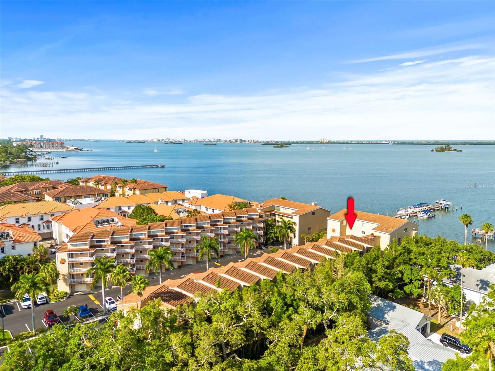 Looking for a turnkey short-term rental with built-in income potential, or your own slice of the Dunedin waterfront lifestyle? This condo-hotel unit at Beso Del Sol is exactly the ticket. Tucked right next to the elevators — meaning you're steps from the pool deck and amenities every single time — this is a resort condo designed from the ground up to work for you.

Here's the part investors love: this unit is a legally recognized resort condominium, which means it's built to rent. There's no minimum stay restriction beyond a single night, so you can capture nightly, weekly, or seasonal guests without the caps that slow down a lot of other condo-hotel investments. Prefer a hands-off approach? The community has an established Rental Company and on-site rental program office ready to manage bookings for you. Want more control? Self-manage and keep more of the upside. Either way, you're not choosing between "investment" and "vacation home" — you get both. Boat slips for rent. 

The resort itself is set up to keep guests around and coming back: an indoor pool, poolside and beachside concession areas, indoor and outdoor bars, an on-site restaurant, a gameroom, and dock/marina access. There's also a free on-site laundry facility — a small detail that guests and owners both appreciate. Your HOA dues already cover water, sewer, bulk cable TV, and common-area electric — one less thing for you or your property manager to juggle month to month.

Then there's Dunedin itself — the real reason renters keep coming back year after year. This is one of the most walkable, golf-cart-friendly towns on Florida's Gulf Coast, with a downtown built for wandering: craft breweries, waterfront restaurants, boutique shopping, and a packed calendar of festivals and live music almost every weekend. Hop on the Pinellas Trail right from town for 28+ miles of biking and walking, or take a short ride to Honeymoon Island State Park and the ferry over to Caladesi Island — regularly ranked among the top beaches in the country. Add in easy access to the marina and waterfront, and you've got a location that pulls tourists, snowbirds, and weekend visitors consistently, all year long — exactly the kind of steady demand that keeps a short-term rental calendar full.

Whether you're chasing strong occupancy numbers, want a low-maintenance beach getaway you can rent out when you're not using it, or you're simply ready to own a piece of one of the Gulf Coast's most in-demand small towns, this Beso Del Sol unit checks every box. Properties like this in Dunedin don't sit long — schedule your showing today before someone else claims this one.