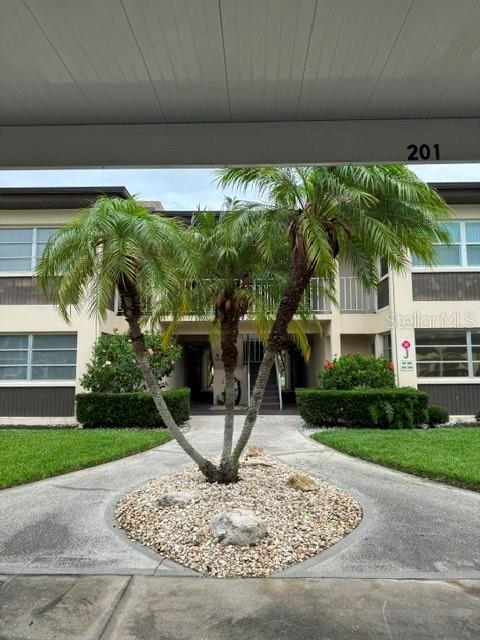 Gorgeous remodeled condo on the first floor in Gulf Harbors. New kitchen cabinets, HVAC, bathroom vanities, water heater, receptacles and doors. New vinyl plank flooring and paint. PGT hurricane rated windows. Cute kitchen with stainless steel appliances which includes side by side refrigerator, stove, dishwasher and microwave. Granite counter tops. Primary bedroom with a private bathroom and a walk-in closet. Large sunroom overlooking a garden area. The monthly maintenance fee includes water/sewer, trash pick-up, basic cable, internet, exterior maintenance, escrow reserves, community pool, and grounds maintenance. Assigned covered parking.