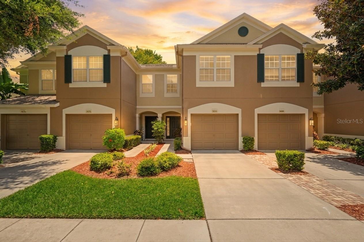 Virtually Staged. Discover the lifestyle you've been searching for at Solana Bay, one of Tampa's most sought-after gated townhome communities — where lush landscaping, resort-style amenities, and an unbeatable location come together in one exceptional address. This beautifully appointed Milan floorplan by Pulte Homes offers 3 bedrooms, 2.5 bathrooms, a 1-car garage, and a covered, screened lanai — everything today's Tampa buyer is looking for. From the moment you arrive, tree-lined streets canopied by majestic Palms, Oaks, and Magnolias set the tone for something truly special. Step through the courtyard covered entry and you're immediately greeted by soaring volume ceilings, a bright open layout, and a seamless flow from the kitchen straight through the living area to your private screened lanai — a view that will stop you in your tracks. The heart of this home is a show-stopping kitchen featuring rich wood cabinetry, brand-new quartz countertops, stainless steel appliances, a generous breakfast bar, and an eat-in dining area — equally perfect for weeknight dinners or weekend entertaining. The flexible living space accommodates oversized furnishings or a more formal arrangement — your call. A powder bath downstairs keeps guests comfortable without interrupting your private spaces above. Upstairs, the primary suite is your personal retreat — complete with vaulted ceilings, a walk-in closet, and space for all your oversized bedroom furniture. The en-suite bath features dual sinks and a tub/shower combination. The upstairs landing includes a laundry closet with washer and dryer included, and two additional spacious bedrooms share a full bath — ideal for family, guests, or a dedicated home office. Step outside and enjoy everything Solana Bay has available: a resort-style swimming pool, BBQ area with charcoal grills, a gated dog park, turf activity field, and direct access to a breathtaking 17-acre private lake — perfect for kayaking, canoeing, or simply watching a stunning Tampa Bay sunset. Your HOA covers basic cable, lawn care, ground maintenance, building insurance and reserves, roof, gated entry, and community pool — so you can spend less time managing and more time living. And the location? Hard to beat. Just a short trip to Target, Walmart, and Planet Fitness. Only minutes to dozens of dining and shopping options, and just a short drive to Tampa International Airport via the Veterans Expressway with direct access to I-275 North and South. Whether you're relocating, downsizing, or buying your first Tampa home, this is the low-maintenance, high-lifestyle move you've been waiting for. Gated. Gorgeous. Move-in ready. Schedule your private showing today — townhomes like this in Tampa don't last long.